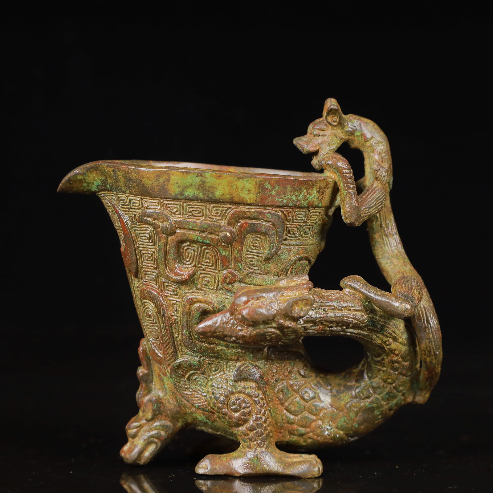 An Archaic Bronze Dragon Libation Cup (1 of 9)