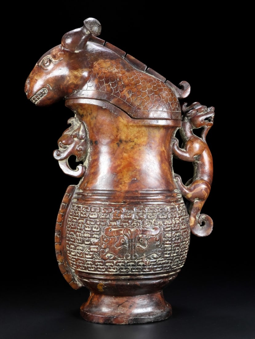 An Archaic Gaogu yu Dragon Pattern Beast-Shaped Ewer: An Archaic Gaogu yu Dragon Pattern Beast-Shaped Ewer,Ancient Time, China,Size:11.2inx7.7inx3.3in,Weight:2.6kg 高古玉龙纹兽形执壶,中国&