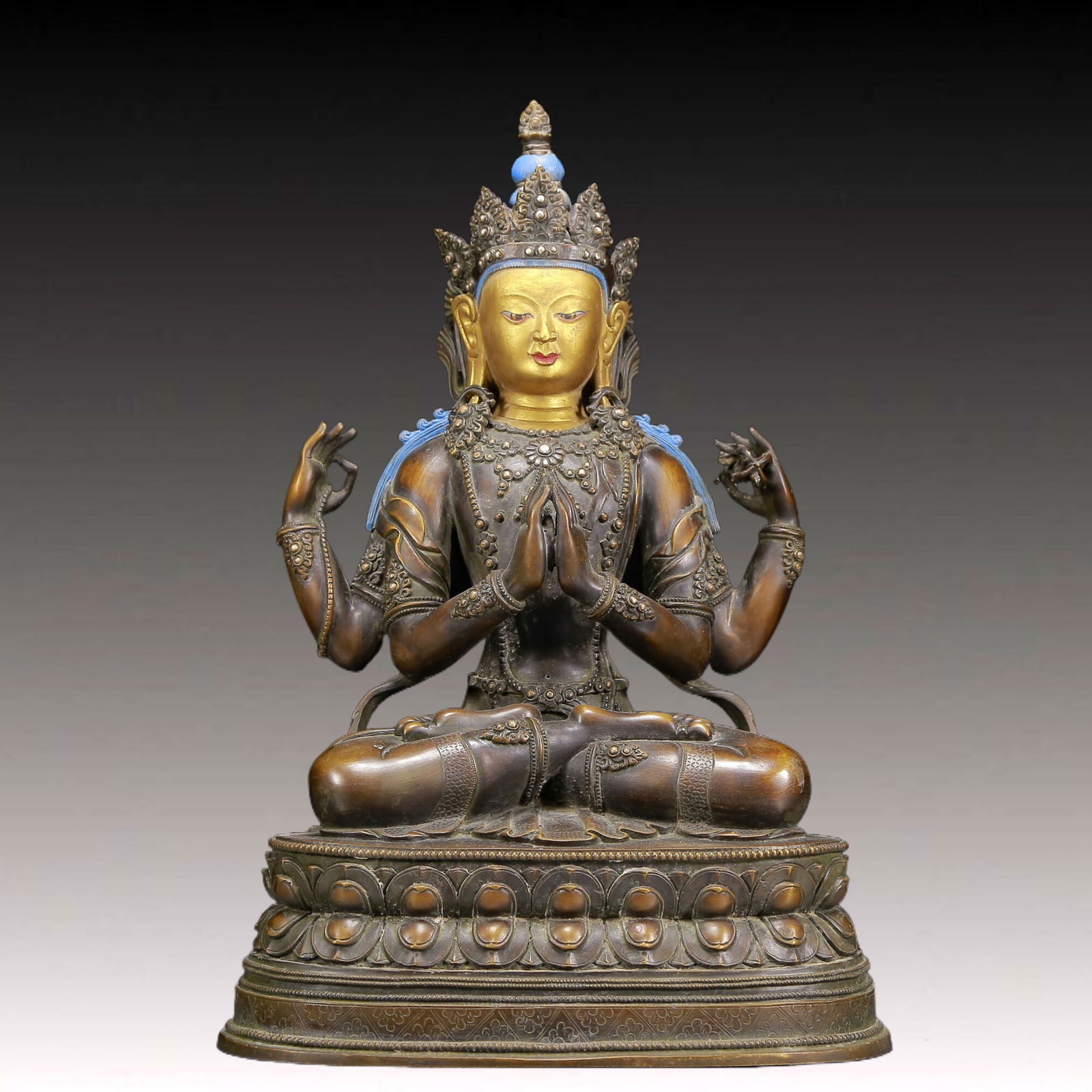 A Solemn Gilt Bronze Statue of Four-Armed Guanyin: A Solemn Gilt Bronze Statue of Four-Armed Guanyin,Ming Dynasty, China,Size:11.8inx8.3inx18.5in,Weight:12540g 铜鎏金四臂观音像，明代