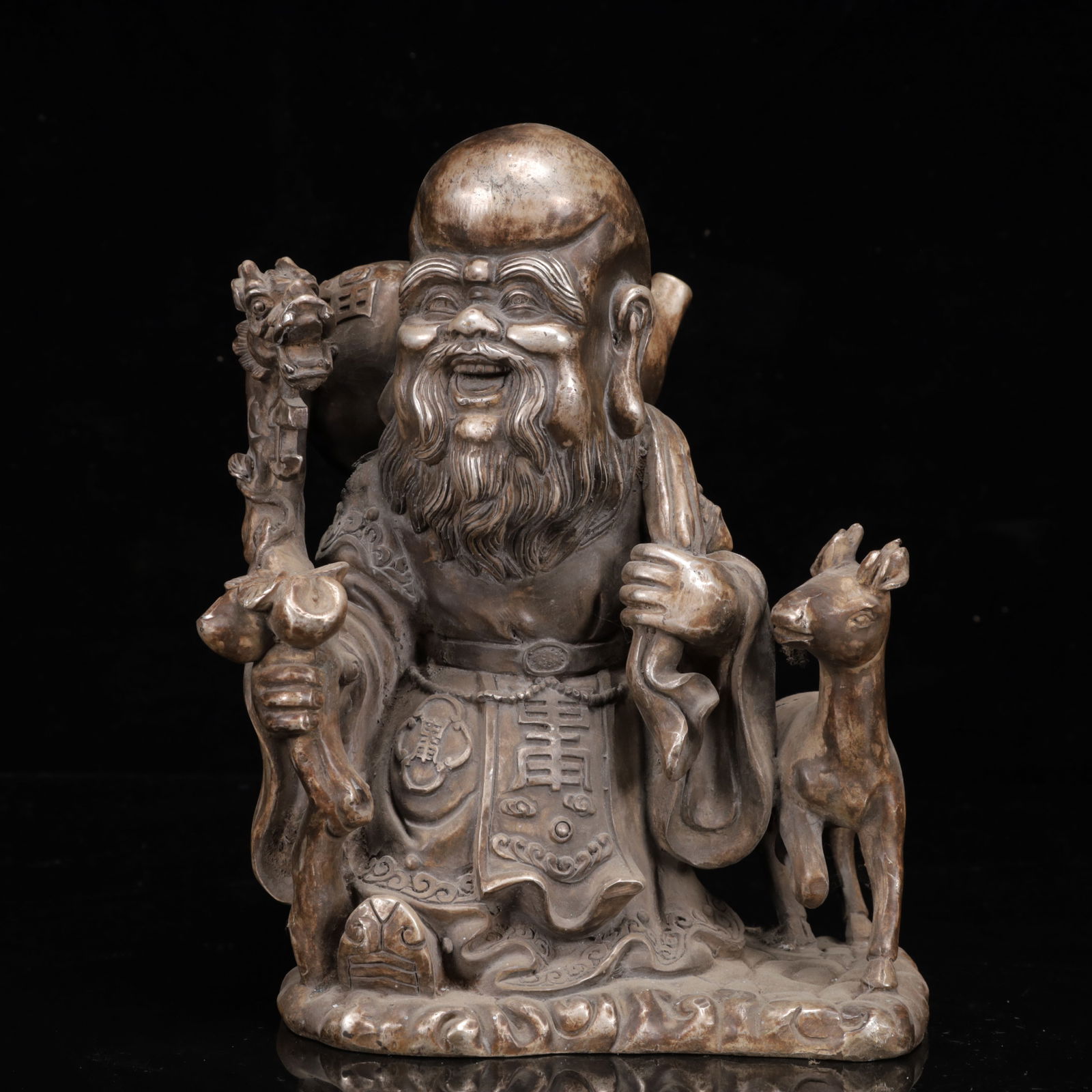 An Exquisite Silver-plated Statue of Longevity: An Exquisite Silver-plated Statue of Longevity ,Qing Dynasty,China,Size:7.1inx5.9inx9.4in,Weight:2950g 镀银寿星像,中国清代