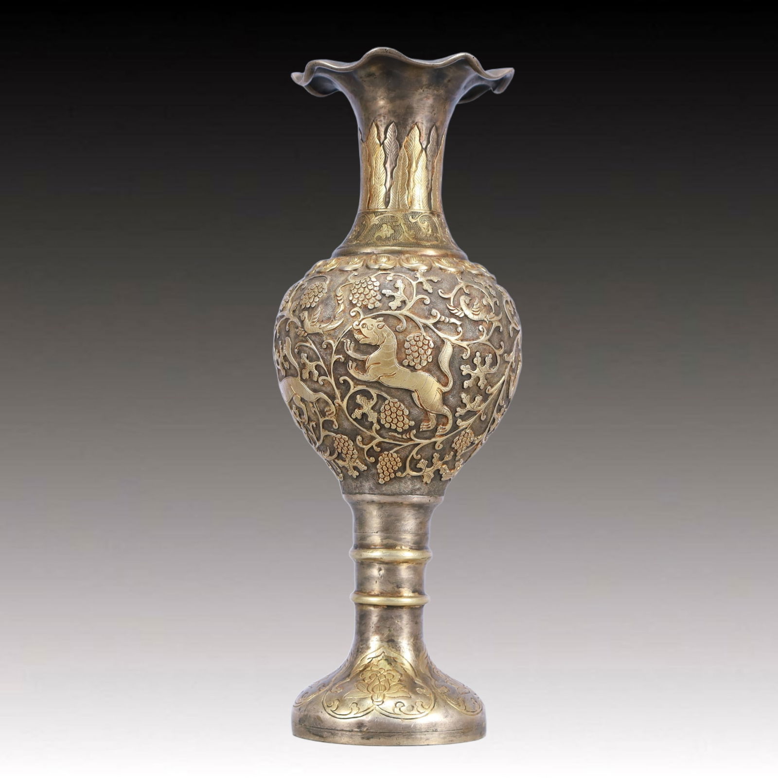 A Rare Gilt Silver Auspicious Beast Pattern Vase: A Rare Gilt Silver Auspicious Beast Pattern Vase,Tang Dynasty, China,Size:3.9inx9.4in,Weight:600g 银鎏金瑞兽纹瓶,中国唐代