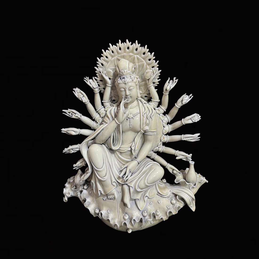 A Solemn Blance-De-Chine Statue of Thousand-Hand Avalokitesvara: A Solemn Blance-De-Chine Statue of Thousand-Hand Avalokitesvara,Ming Dynasty,China,He Chaozong Mark,Size:18.9inx14.6in 德化瓷千手观音像,中国