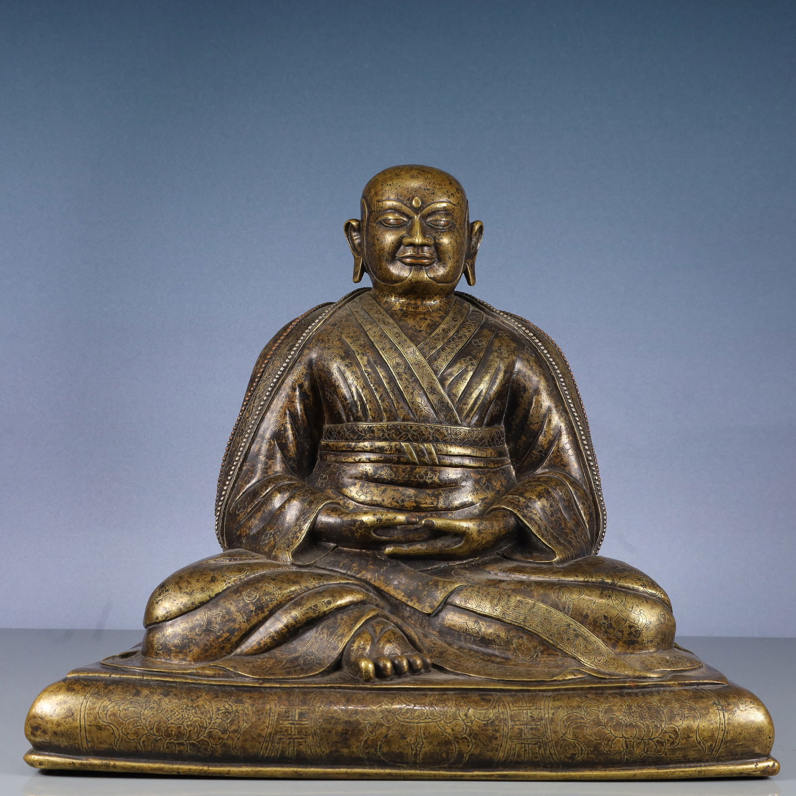 A Solemn Bronze Inlaid Silver Statue of Guru,With Inscription: A Solemn Bronze Inlaid Silver Statue of Guru,With Inscription,Qing Dynasty, China,Size:15.4inx10.6inx14.6in,Weight:13200g 