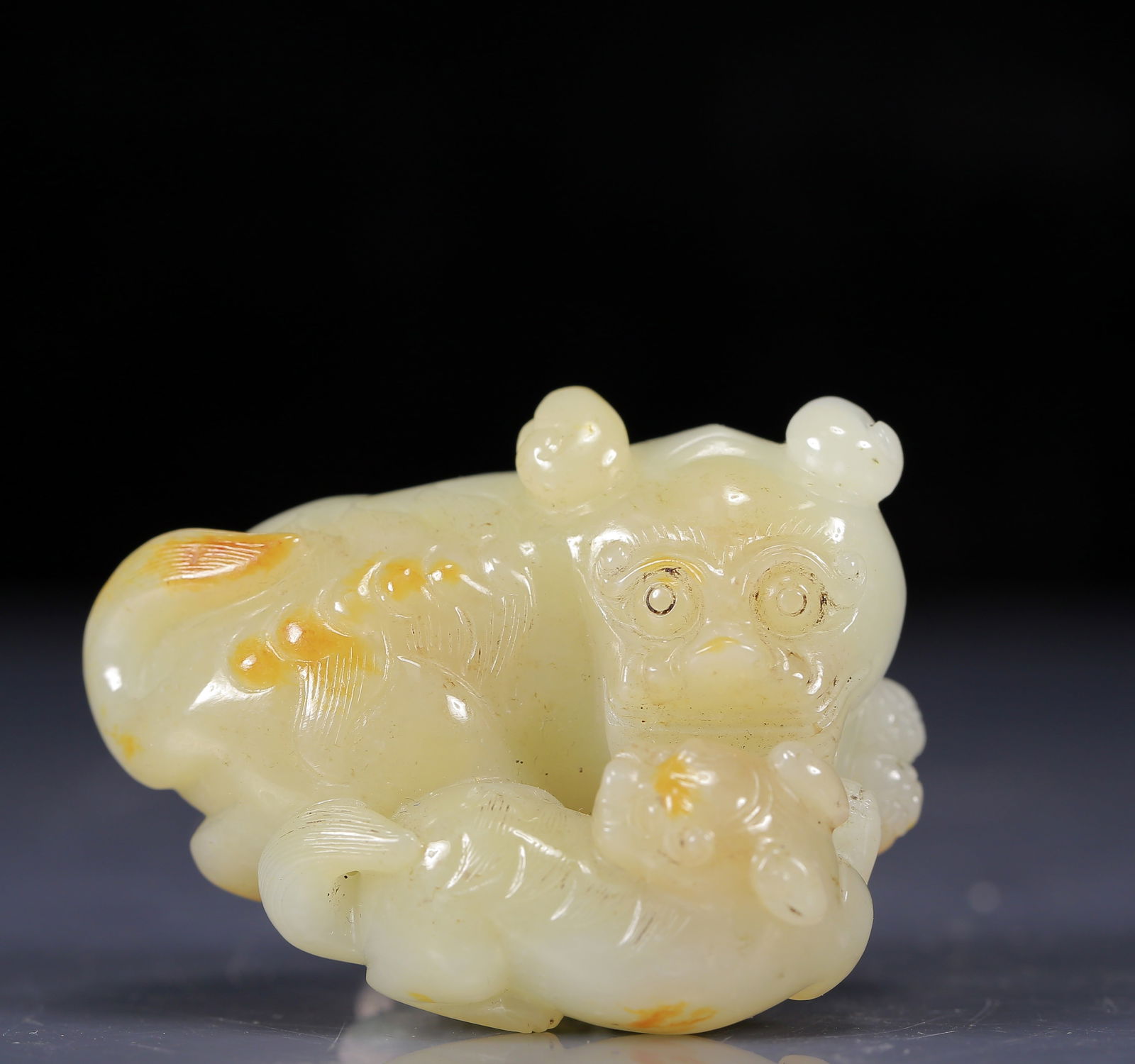 An Exquisite White Jade Auspicious Beast Ornament: An Exquisite White Jade Auspicious Beast Ornament ,Qing Dynasty, China,Size:2.4inx2inx1.2in,Weight:115g 白玉子母兽摆件，清代