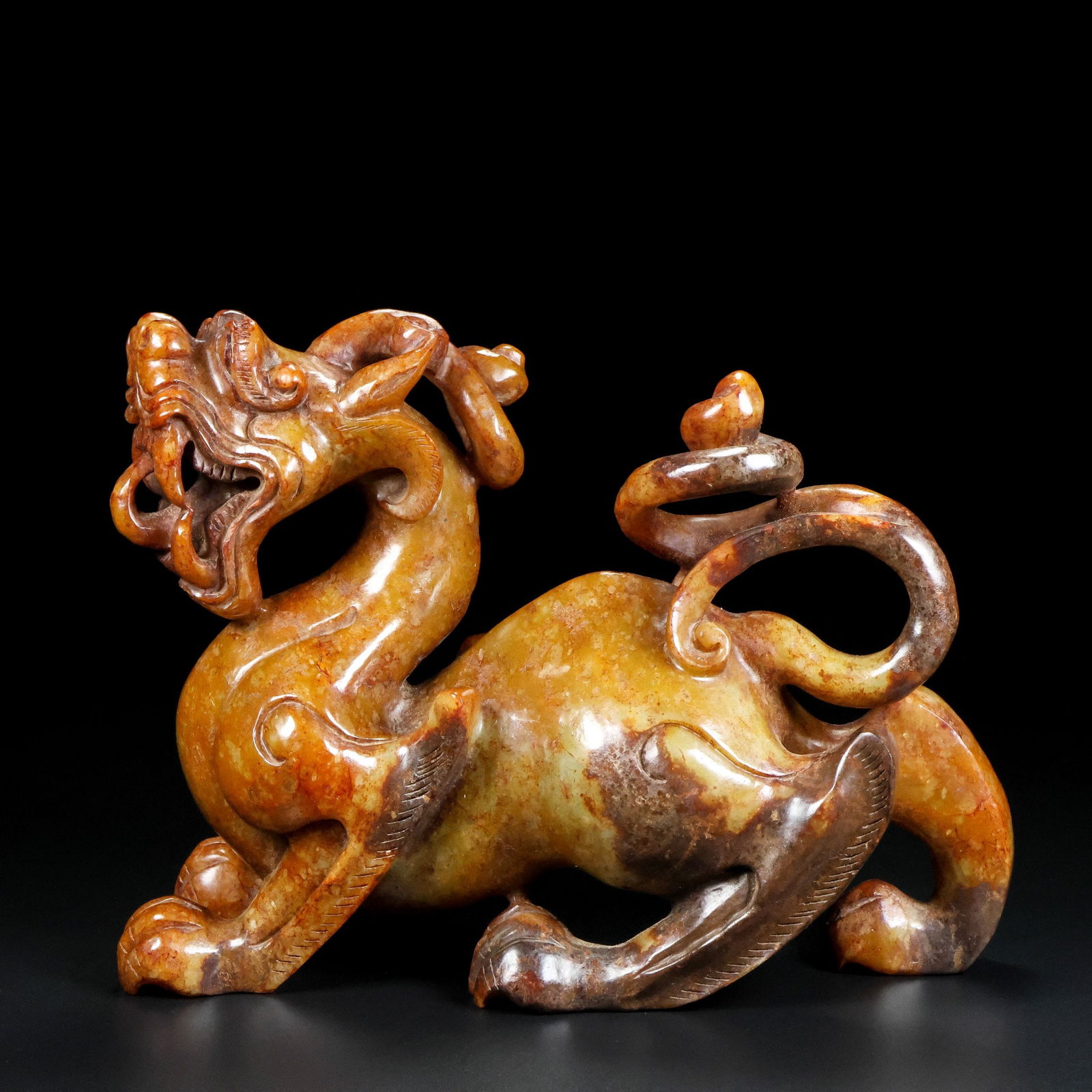 An Exquisite Archaic Jade Auspicious Beast Ornament: An Exquisite Archaic Jade Auspicious Beast Ornament,Ancient Time,China,Size:9.4inx7.1inx3.5in,Weight:2604g 