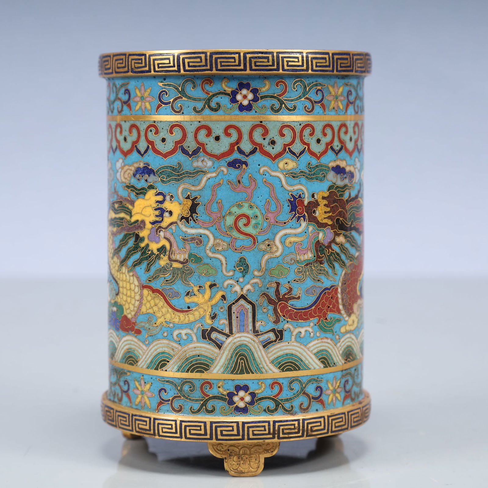 An Exquisite Cloisonne Seawater,Auspicious Cloud and Dragon Pattern Tripod Brush Pot: An Exquisite Cloisonne Seawater,Auspicious Cloud and Dragon Pattern Tripod Brush Pot,Qing Dynasty, China,Qianlong Four-character Mark,Size:3.5inx5.3in,Weight:650g 