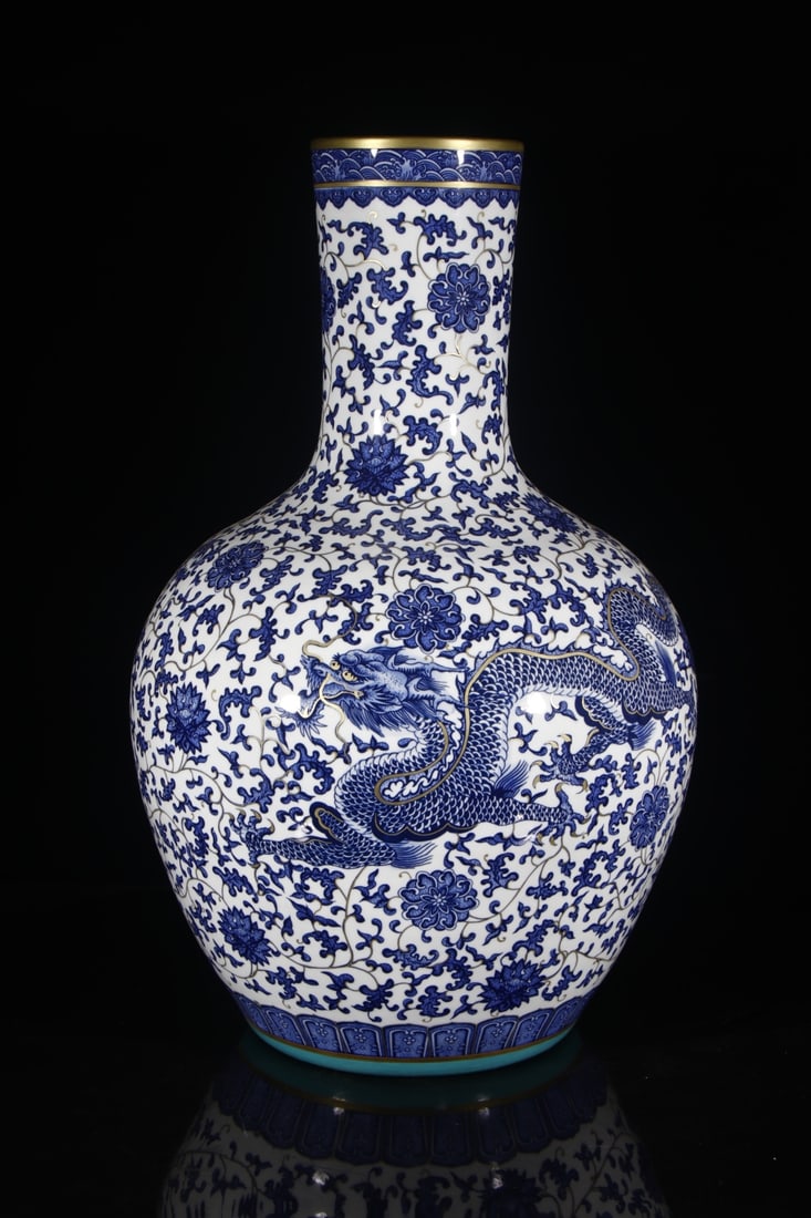 A Huge Blue and White Lotus and Dragon Pattern Vase: A Huge Blue and White Lotus and Dragon Pattern Vase,Qing Dynasty,China,Qianlong Six-character Mark,Size:28.9inx10.2in 青花缠枝莲龙纹瓶,中国&
