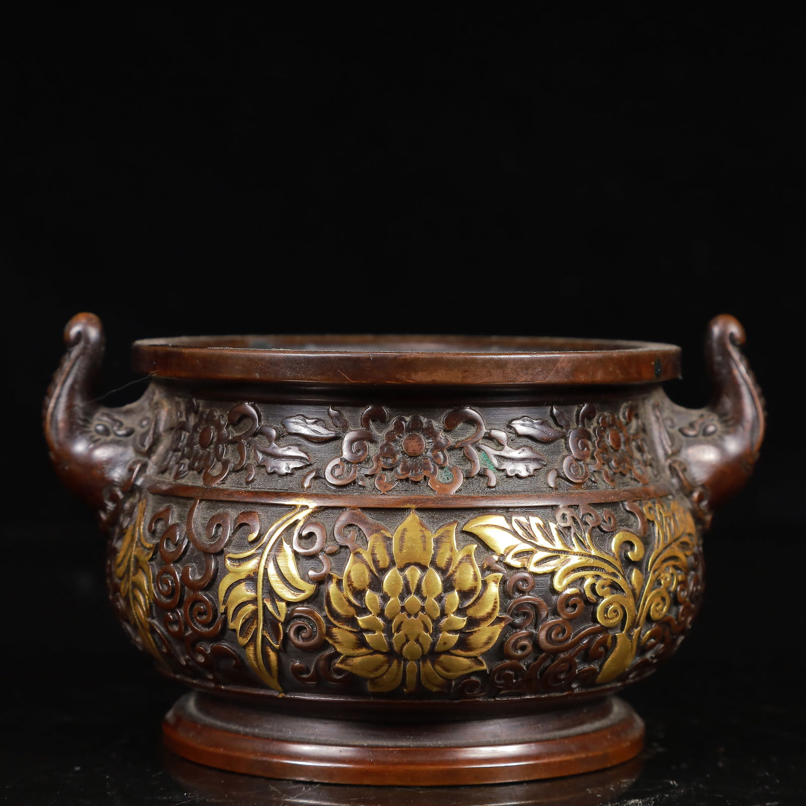 A Rare Bronze Flower Pattern Double-Ears Censer: A Rare Bronze Flower Pattern Double-Ears Censer,Ming Dynasty,China,Xuande Six-character Mark,Size:5.1inx3.9inx3.1in,Weight:1350g 