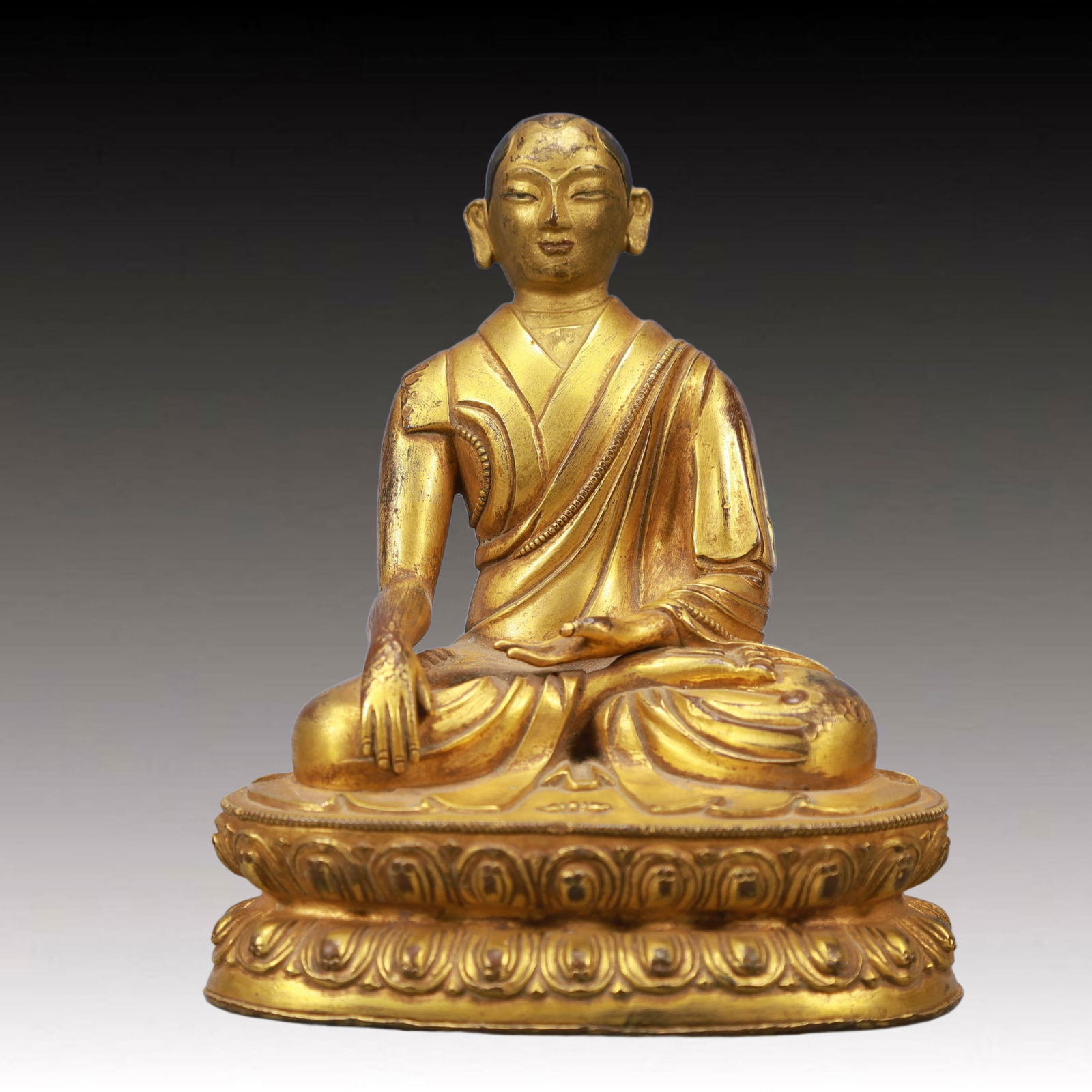 A Solemn Gilt Bronze Statue of Guru: A Solemn Gilt Bronze Statue of Guru,Ming Dynasty, China,Size:4.7inx3.1inx5.7in Weight:950g 铜鎏金上师像,中国明代