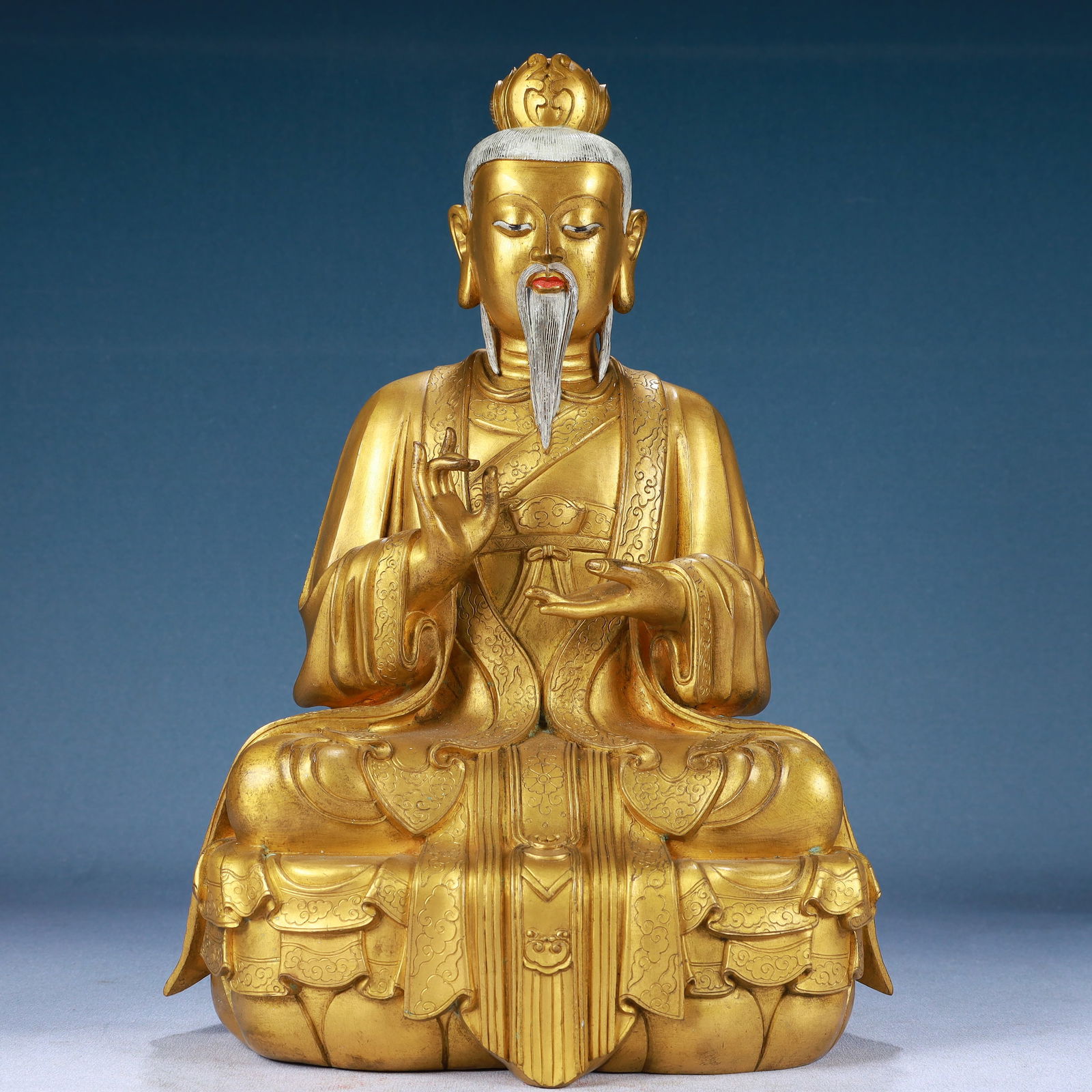 A Solemn Gilt Bronze Buddha Statue: A Solemn Gilt Bronze Buddha Statue,Qing Dynasty, China,Size:10.2inx7.9inx15in,Weight:10800g 铜鎏金佛像,中国清代
