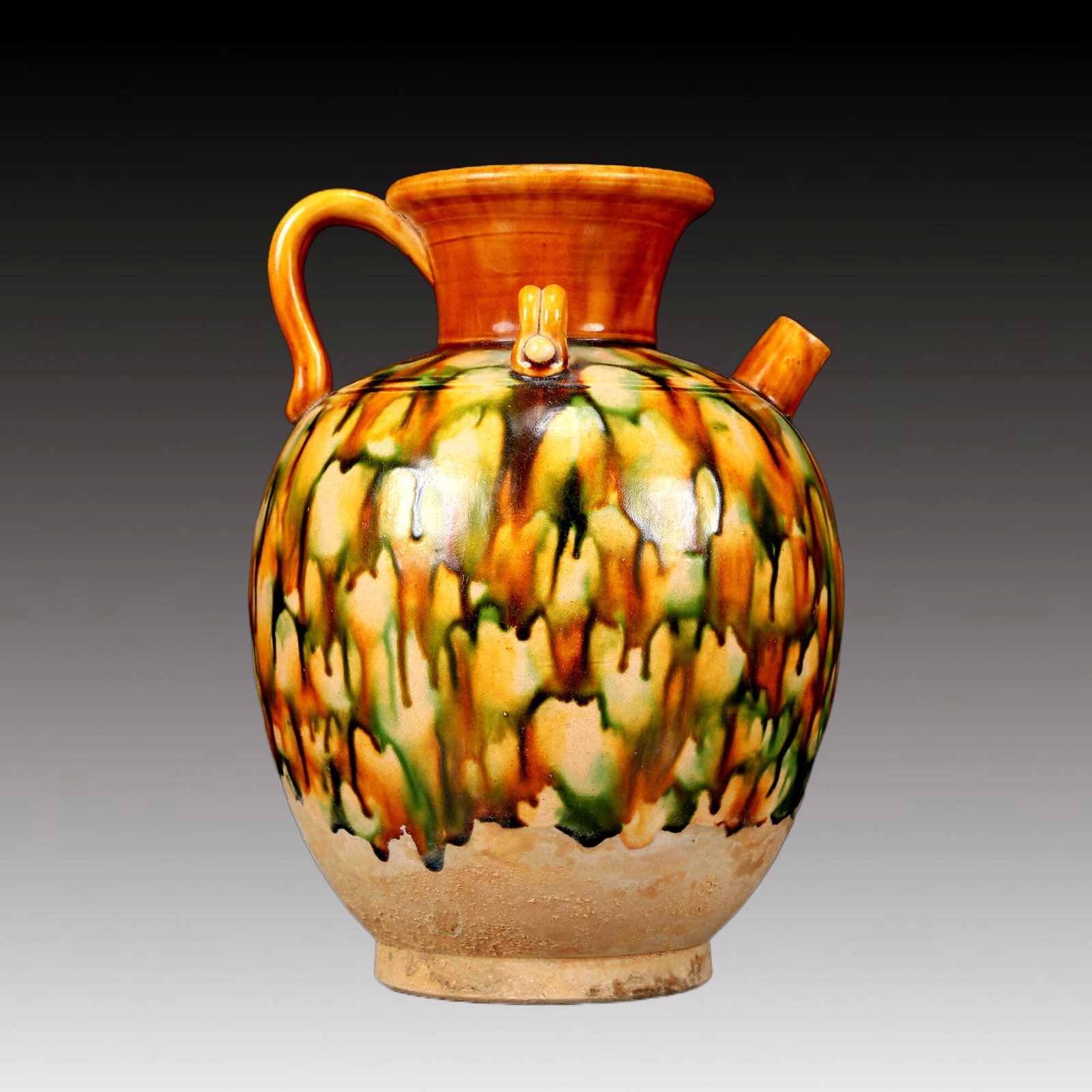 A Rare Tang Tri-Color Glazed Pottery Ewer: A Rare Tang Tri-Color Glazed Pottery Ewer,Tang Dynasty, China,Chinese Tang Tri-colored Pottery, or Tang Sancai, flourished during the Tang Dynasty (618–907 AD). It's renowned for its vibrant