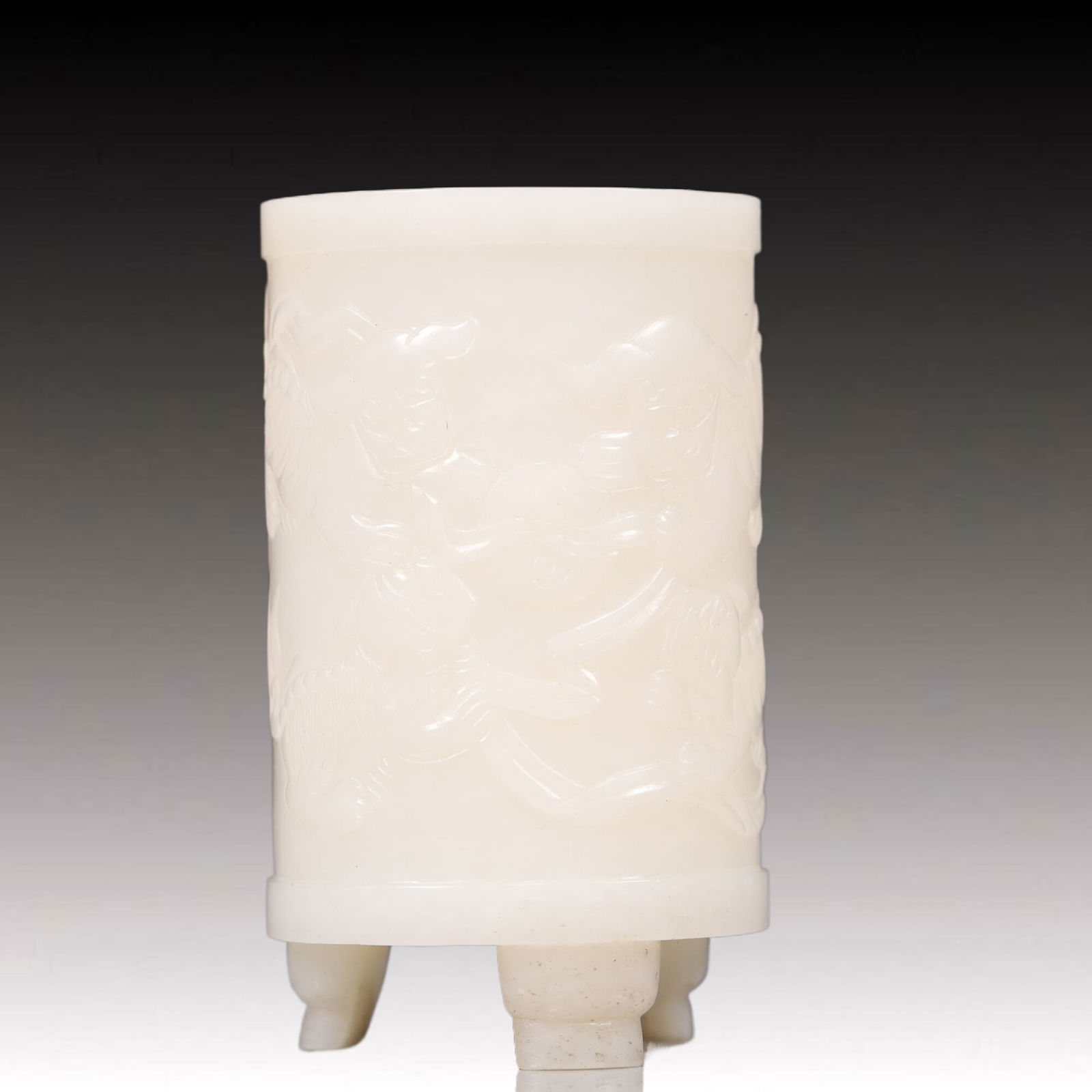 An Exquisite White Jade Lion Brush Pot: An Exquisite White Jade Lion Brush Pot, Qing Dynasty, China,Weight:2inx3.3in,Weight:200g 白玉狮笔筒, 中国清代