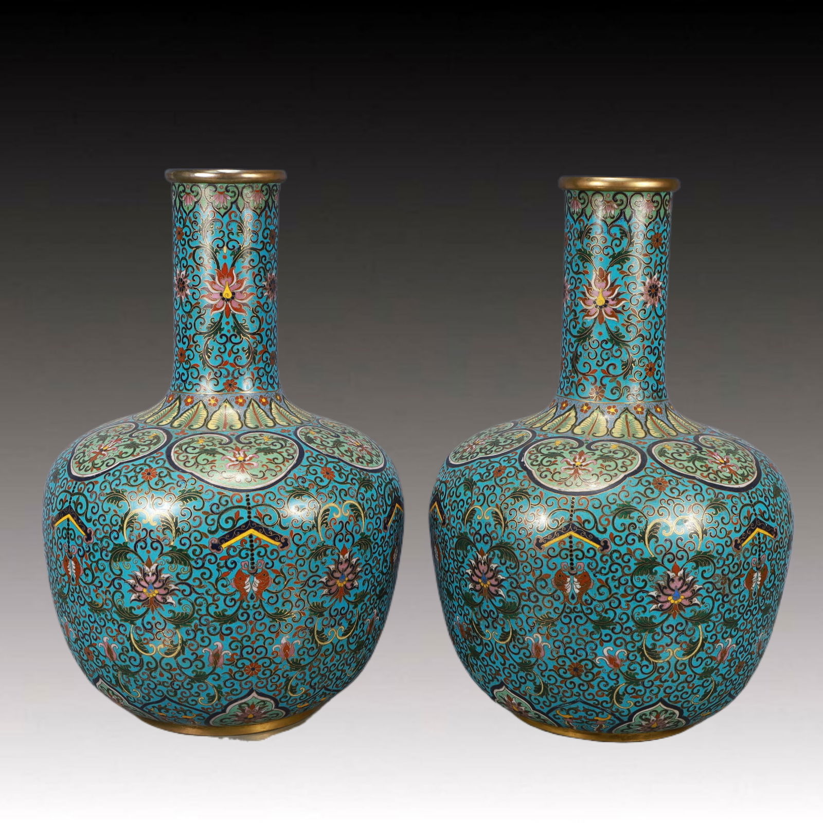 A Pair of Huge Cloisonne Lotus Pattern Vases: A Pair of Huge Cloisonne Lotus Pattern Vases,Qing Dynasty,China,Qianlong Four-character Mark,Size:12.6inx18.9in,Total Weight:9000g 