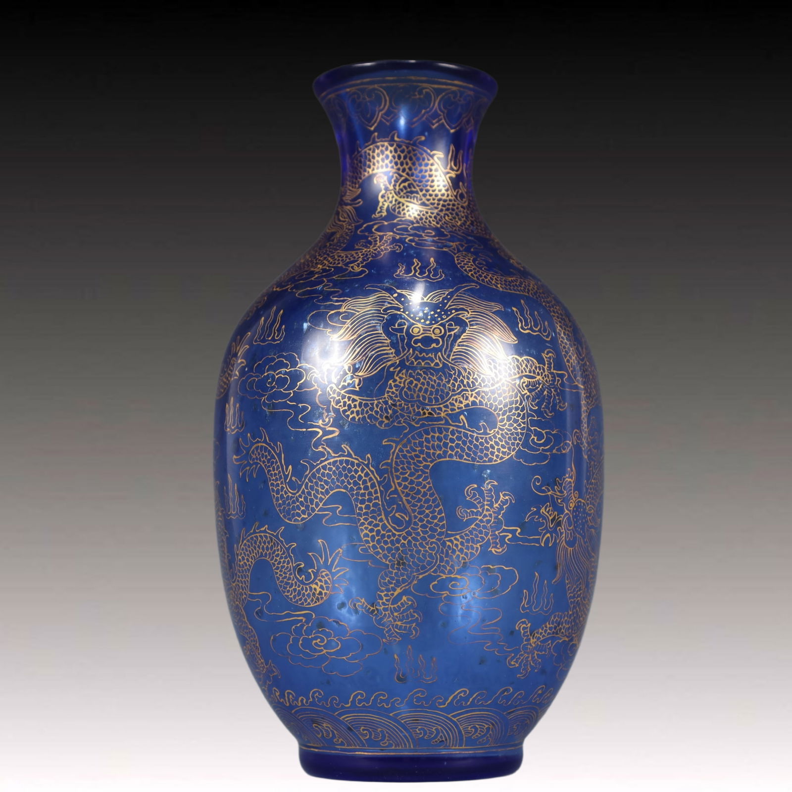 A Precious Coloured glaze Blue Glazed Painted Gold Auspicious Cloud and Dragon Pattern Vase: A Precious Coloured glaze Blue Glazed Painted Gold Auspicious Cloud and Dragon Pattern Vase,Qing Dynasty, China,Qianlong Four-character Mark,Size:3.9inx7.3in Weight:650g 
