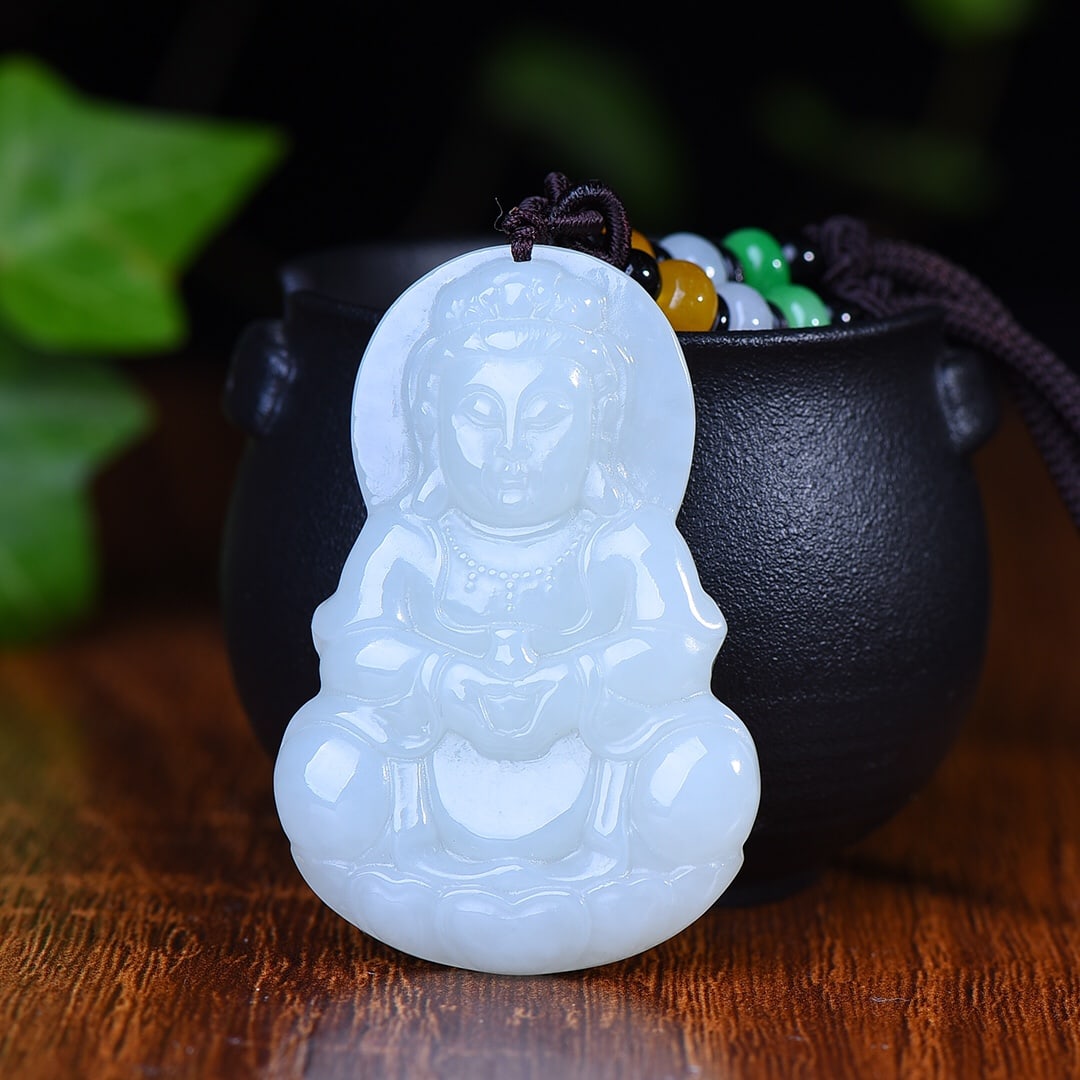 An Exquisite White Jade Avalokitesvara Pendant: An Exquisite White Jade Avalokitesvara Pendant,Size:2.3inx1.5in (寓意)吉祥 保平安 大慈大悲 救苦救难 