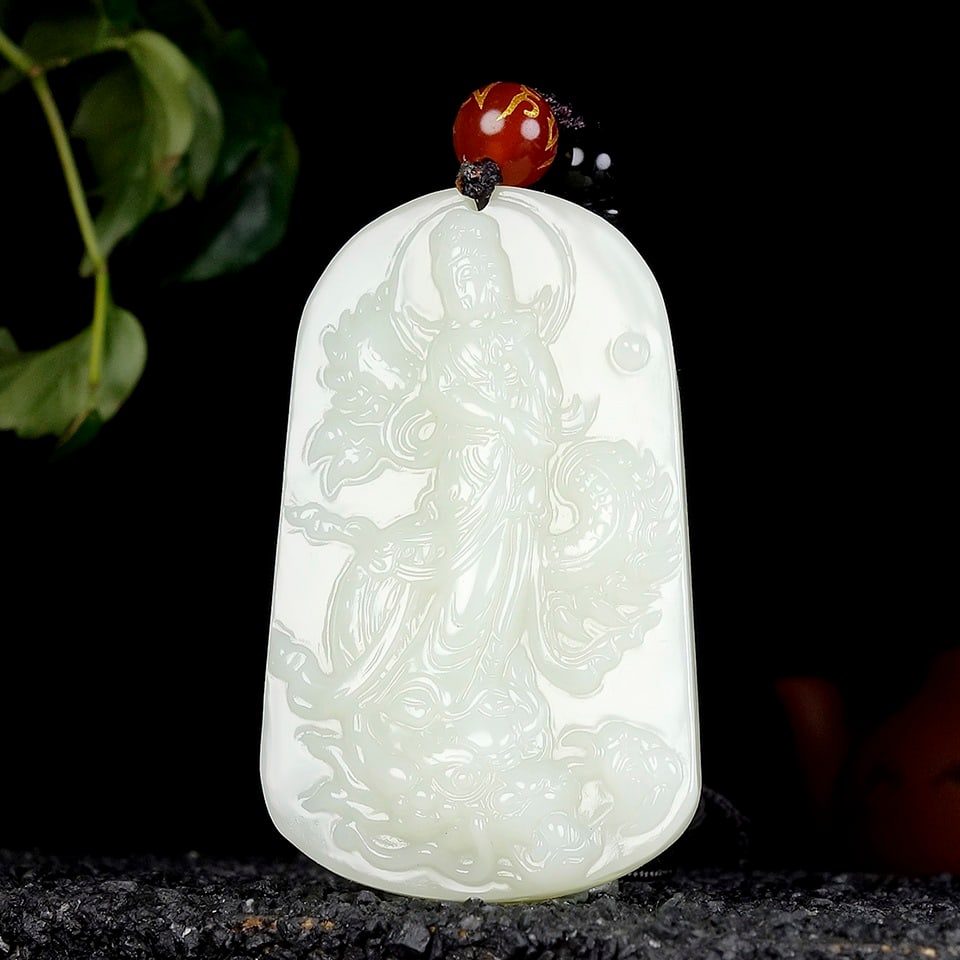 An Exquisite White Jade Statue of Avalokitesvara Pendant: An Exquisite White Jade Statue of Avalokitesvara Pendant,Size:2.2inx1.3inx0.4in 白玉观音像挂件