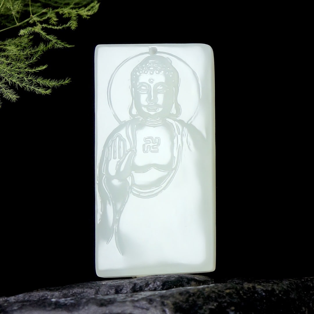 An Exquisite White Jade Statue of Sakyamuni Pendant: An Exquisite White Jade Statue of Sakyamuni Pendant,Size:1.8inx0.9inx0.3in 白玉如来佛像挂件