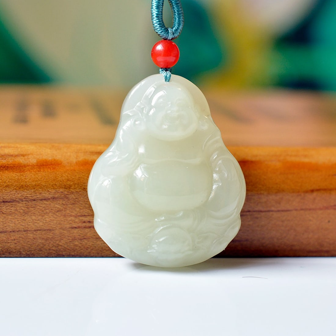 An Exquisite White Jade Statue of Maitreya Buddha Pendant: An Exquisite White Jade Statue of Maitreya Buddha Pendant,Size:1.1inx1.3in 白玉弥勒佛像挂件