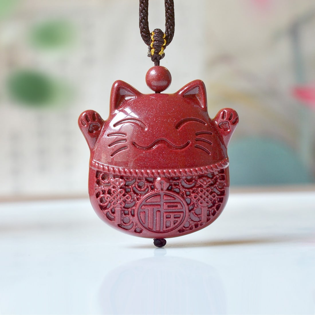 An Exquisite Cinnabar Cat Pendant: An Exquisite Cinnabar Cat Pendant,Size:1.4inx1.4in,Weight:39.14g 朱砂猫挂件