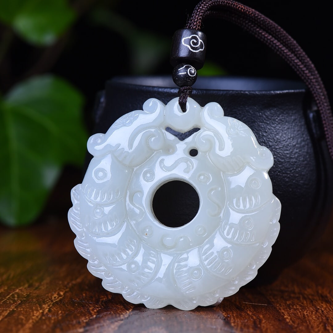 An Exquisite White Jade Beast Pattern Pendant: An Exquisite White Jade Beast Pattern Pendant,Size:2inx2in 白玉兽纹挂件