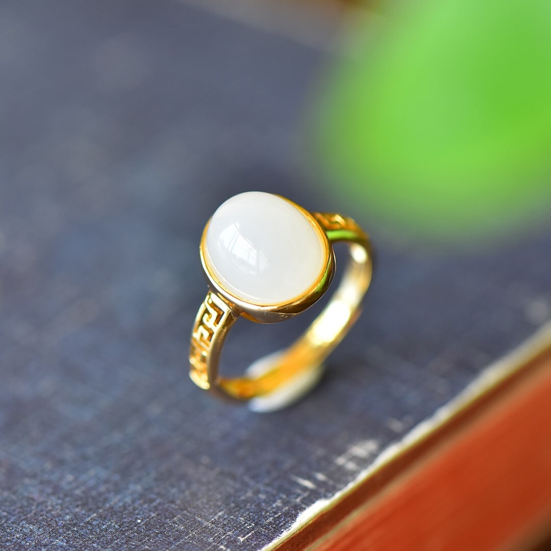 A Pair of Exquisite Sterling Silver-Gold Plated Inlaid White Jade Ring: A Pair of Exquisite Sterling Silver-Gold Plated Inlaid White Jade Ring,Size:0.4inx0.5in 纯银镀金镶白玉戒指