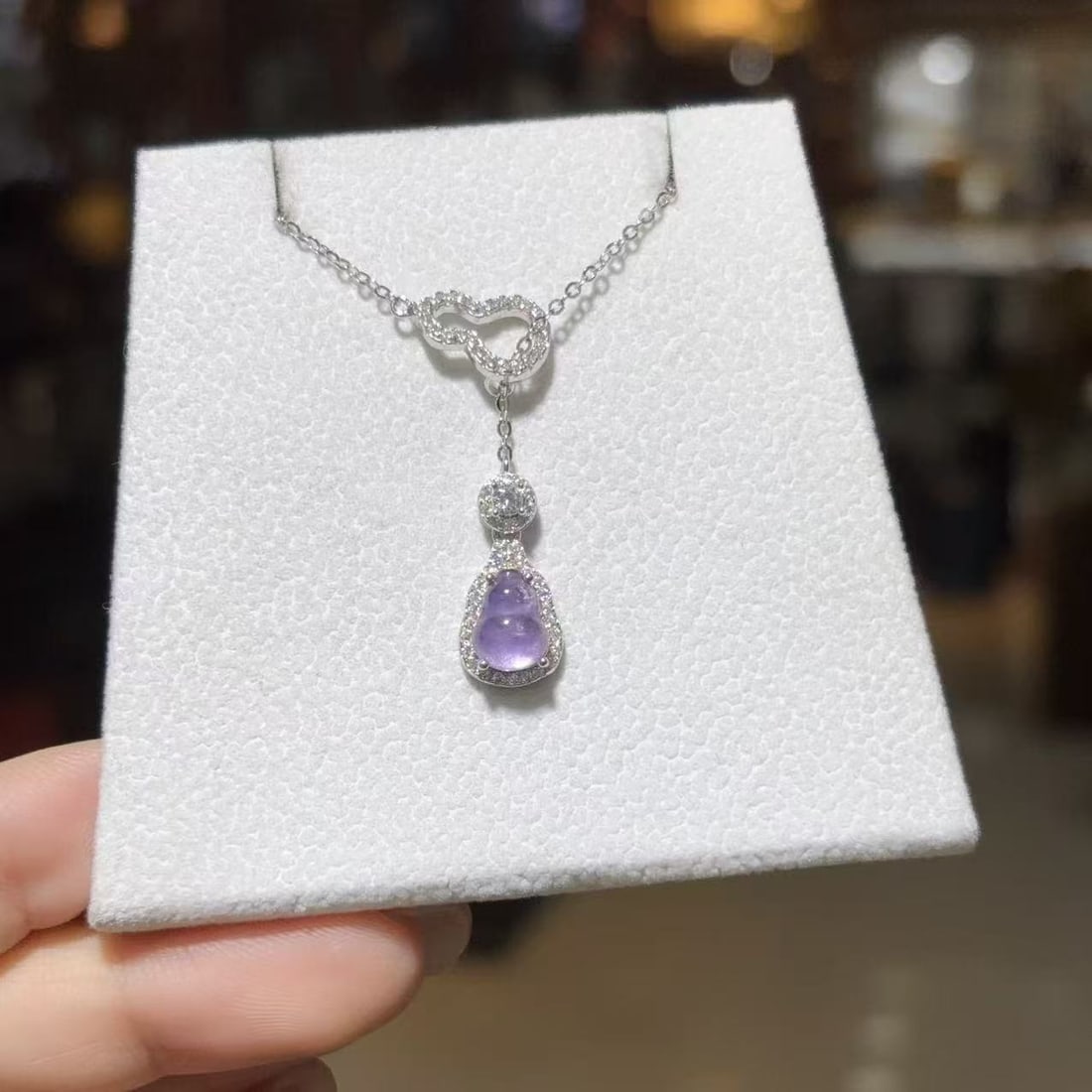 An Exquisite Sterling Silver Inlaid Crystal Gourd Pendant,Inlaid Diamond: An Exquisite Sterling Silver Inlaid Crystal Gourd Pendant,Inlaid Diamond,Size:0.2inx0.3in 寓意:福禄双全,紫气东来 