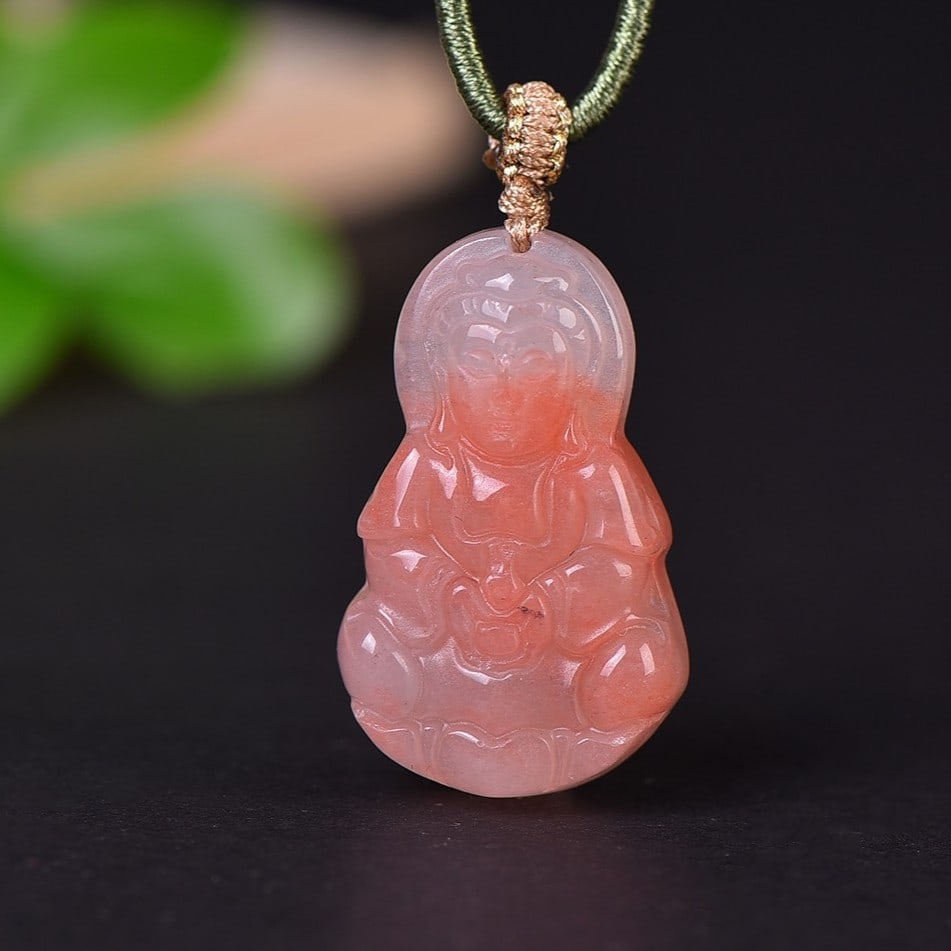 An Exquisite Red Jade Statue of Avalokitesvara Pendant: An Exquisite Red Jade Statue of Avalokitesvara Pendant,Size:0.8inx1.4in 红玉观音挂件