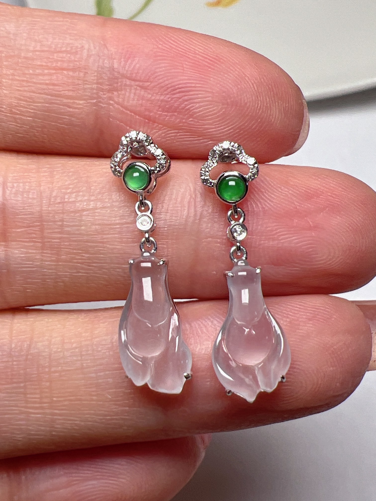 A Pair of Exquisite 18k Gold Diamond Inlaid Jadeite Earrings: A Pair of Exquisite 18k Gold Diamond Inlaid Jadeite Earrings,Size(Loose Stone):0.5inx0.3in 一对18k金钻镶嵌翡翠耳环