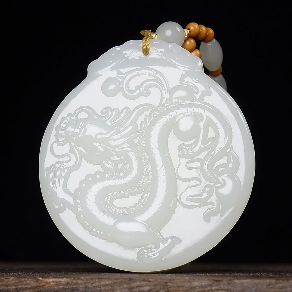 An Exquisite White Jade Dragon Pattern Pendant: An Exquisite White Jade Dragon Pattern Pendant,Size:1.9inx1.7inx0.3in 白玉龙纹挂件
