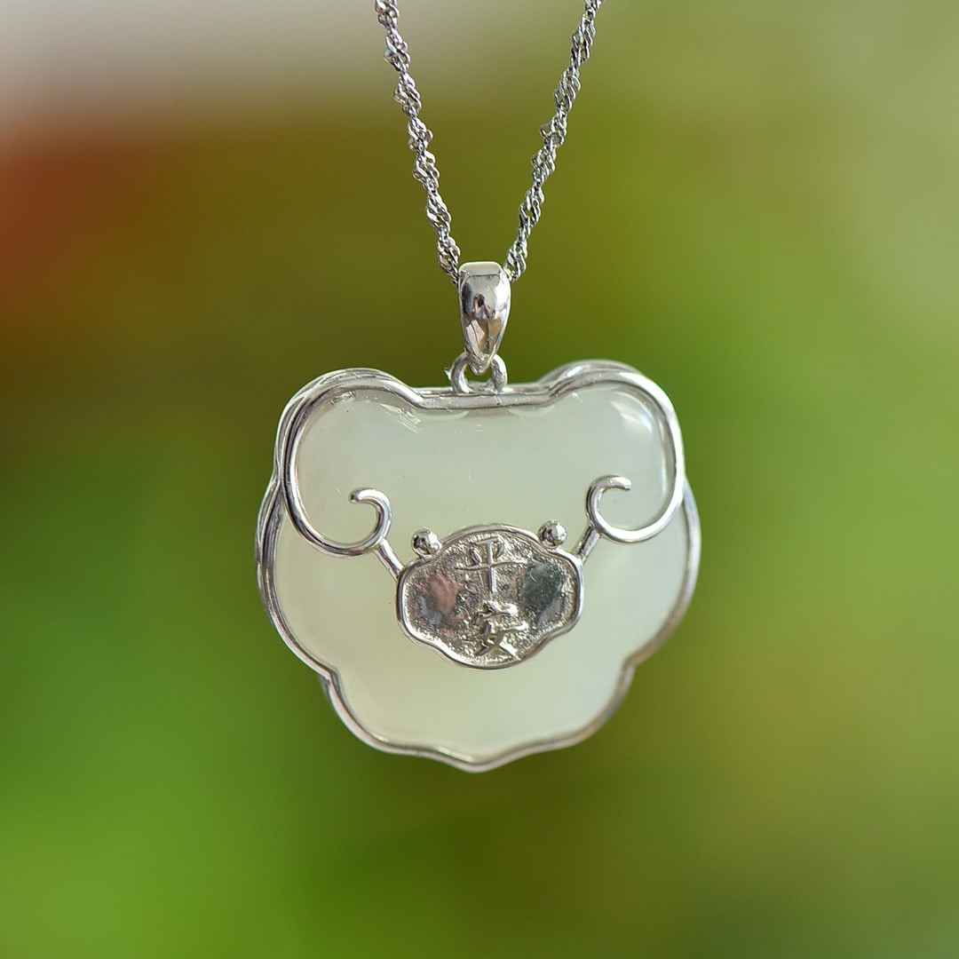 An Exquisite Sterling Silver Inlaid White Jade Pendant: An Exquisite Sterling Silver Inlaid White Jade Pendant,Size:0.9inx1in 纯银镶白玉吊坠