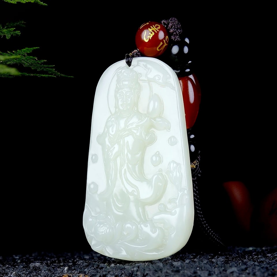 An Exquisite White Jade Statue of Avalokitesvara Pendant: An Exquisite White Jade Statue of Avalokitesvara Pendant,Size:1.9inx1.1inx0.3in 白玉观音像挂件