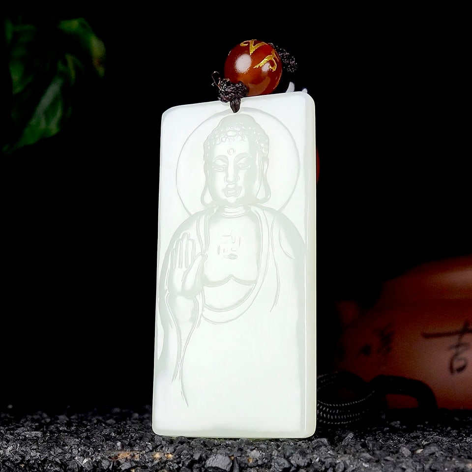 An Exquisite White Jade Statue of Sakyamuni Pendant: An Exquisite White Jade Statue of Sakyamuni Pendant,Size:1.9inx0.9inx0.3in 白玉如来像挂件