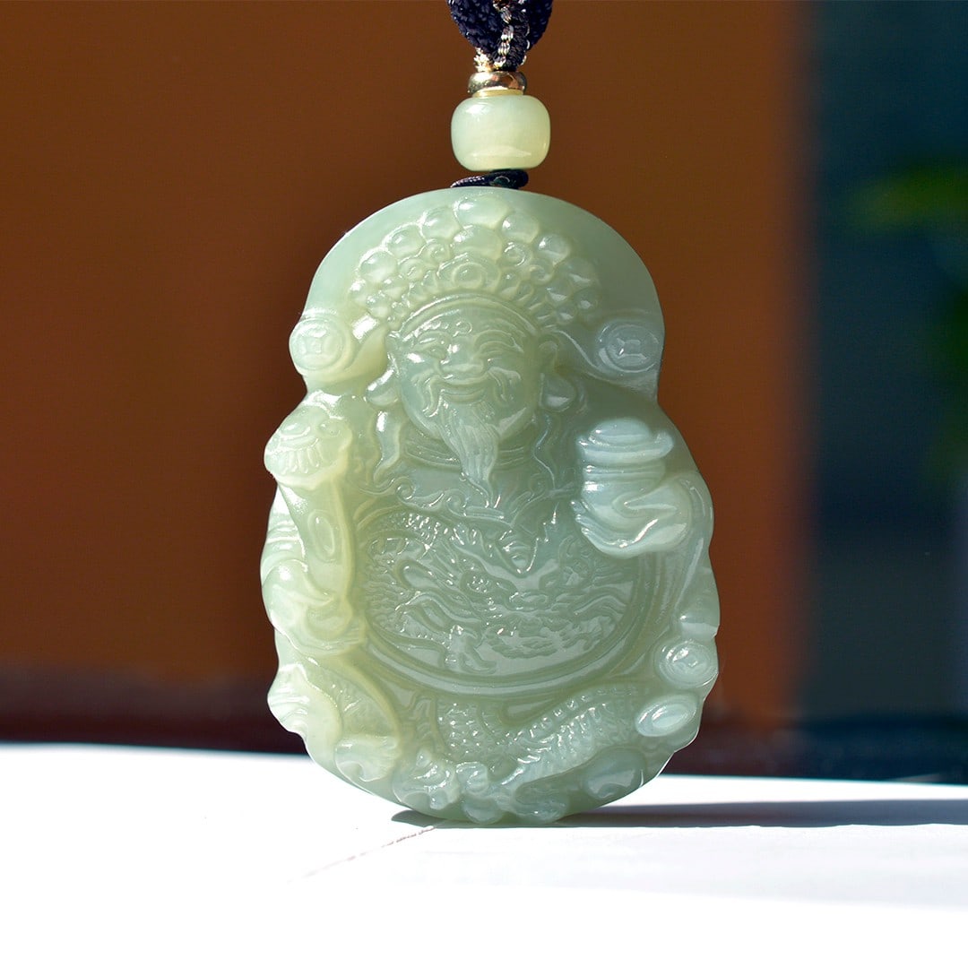 An Exquisite Greenish Jade Statue of Mammon Pendant (1 of 4)