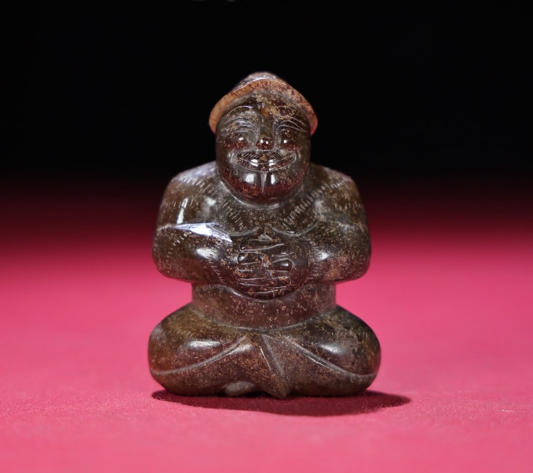 A Exquisite Hotan Jade Human Figure Hand Ornament: A Exquisite Hotan Jade Human Figure Hand Ornament,Han Dynasty,China,Size:2.4inx1.6inx1in,Weight:97g 和田人形手把件,中国汉代