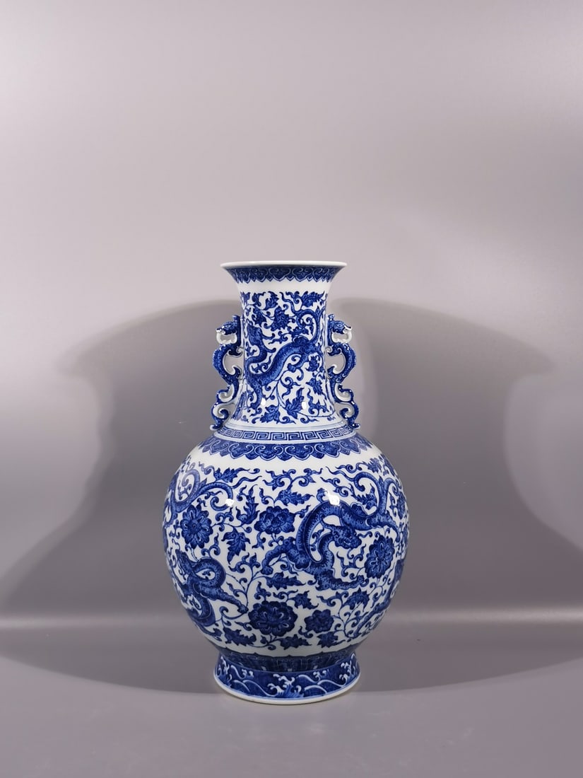 A Exquisite Blue and White Lotus Dragon Pattern Double-Ears Vase: A Exquisite Blue and White Lotus Dragon Pattern Double-Ears Vase,Qing Dynasty, China,Qianlong Six-character Mark,Size: 15.7inx9.3in 