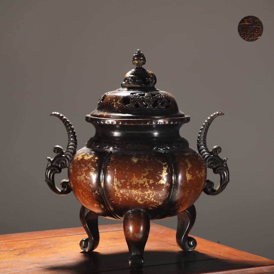 A Exquisite Coppery Gold Splashed Melon-Shaped Tripod Censer: A Exquisite Coppery Gold Splashed Melon-Shaped Tripod Censer,Ming Dynasty,China,Xuande Four-character Mark,Size:9.4inx4.6inx7.9in,Weight:3300g 