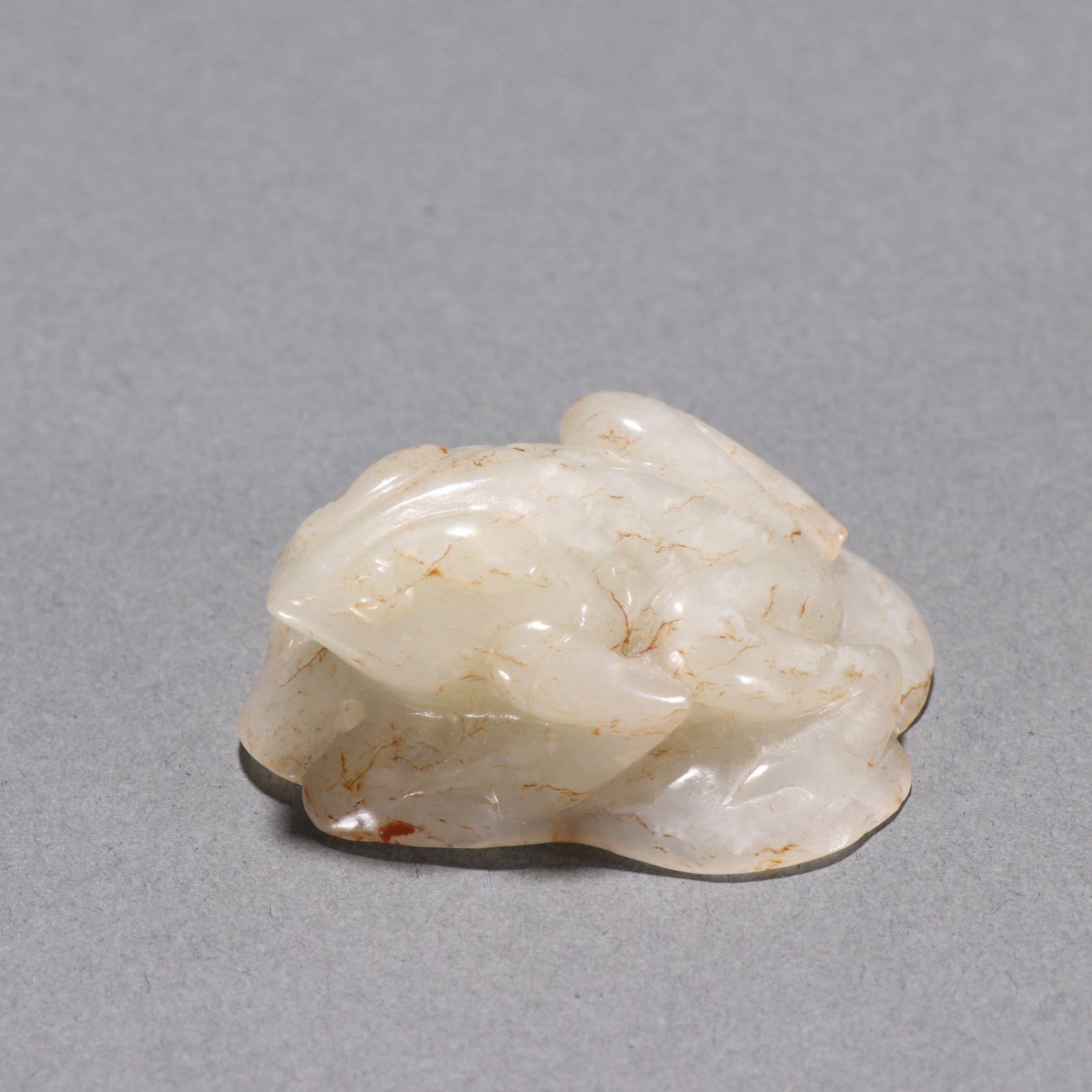 A Exquisite Hotan Jade Frog Ornament: A Exquisite Hotan Jade Frog Ornament,Qing Dynasty, China,Size:0.8inx2in,Weight:46.5g 和田玉青蛙摆件,中国清代