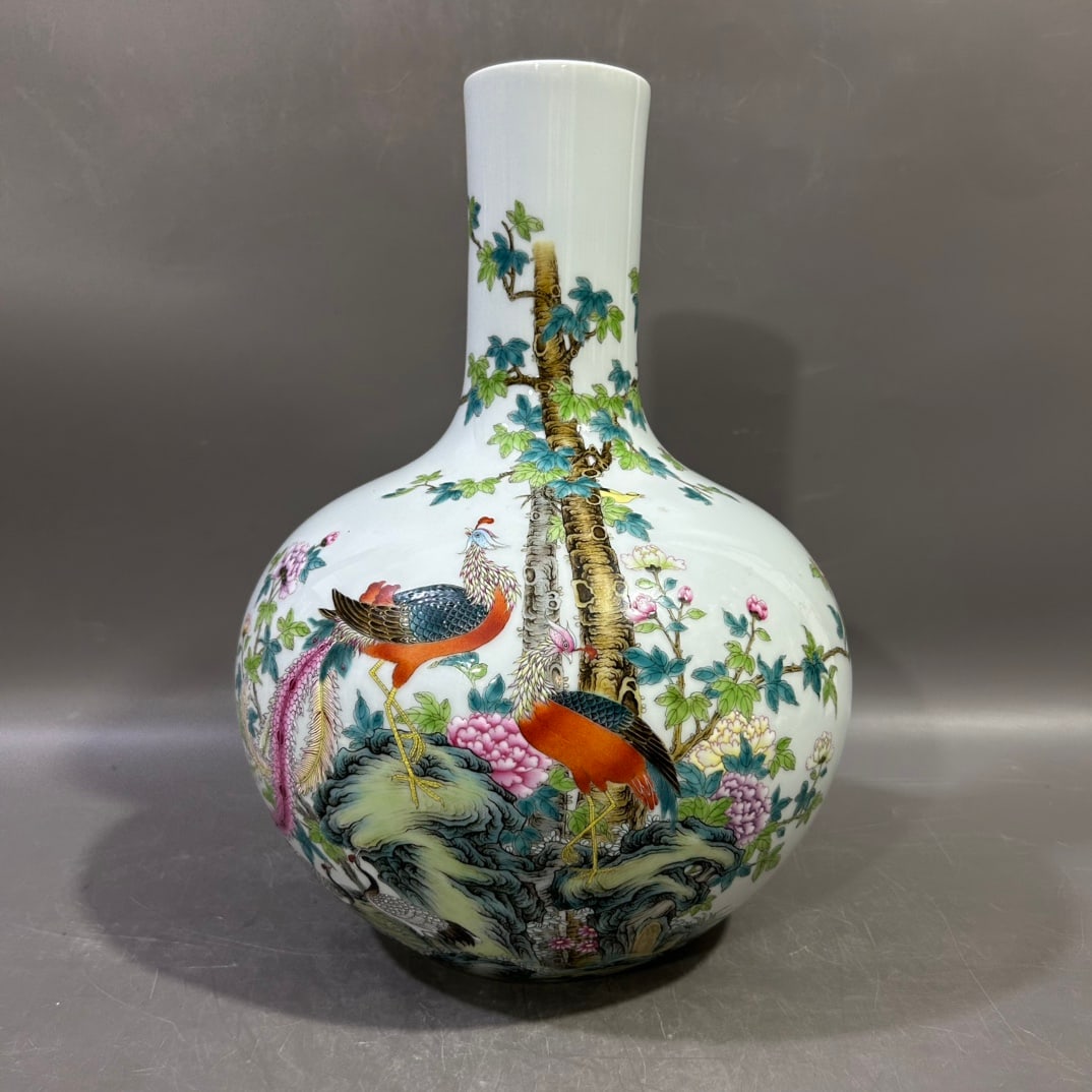 A Exquisite Famille-Rose Flower and Bird Pattern Vase: A Exquisite Famille-Rose Flower and Bird Pattern Vase,Qing Dynasty, China,Yongzheng Six-character Mark,Size:8.3inx13.8in 