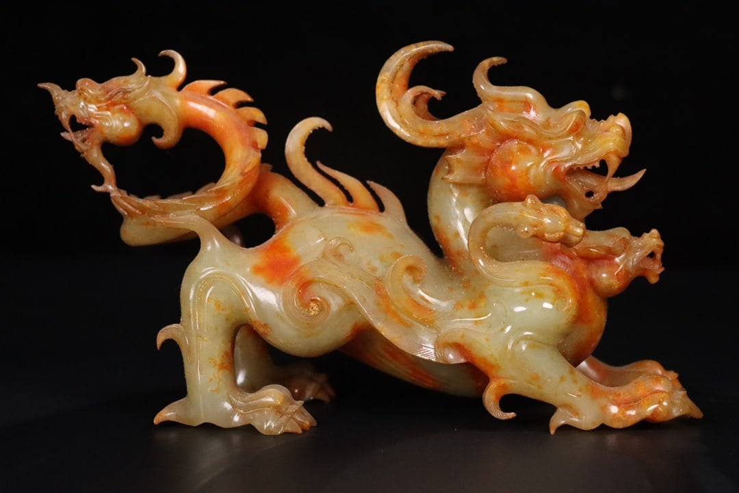 A Exquisite Hotan Jade Auspicious Beast Ornament: A Exquisite Hotan Jade Auspicious Beast Ornament,Han Dynasty, China,Size:8.3inx3.1inx4.9in,Weight:1215g 和田玉瑞兽摆件,中国汉代