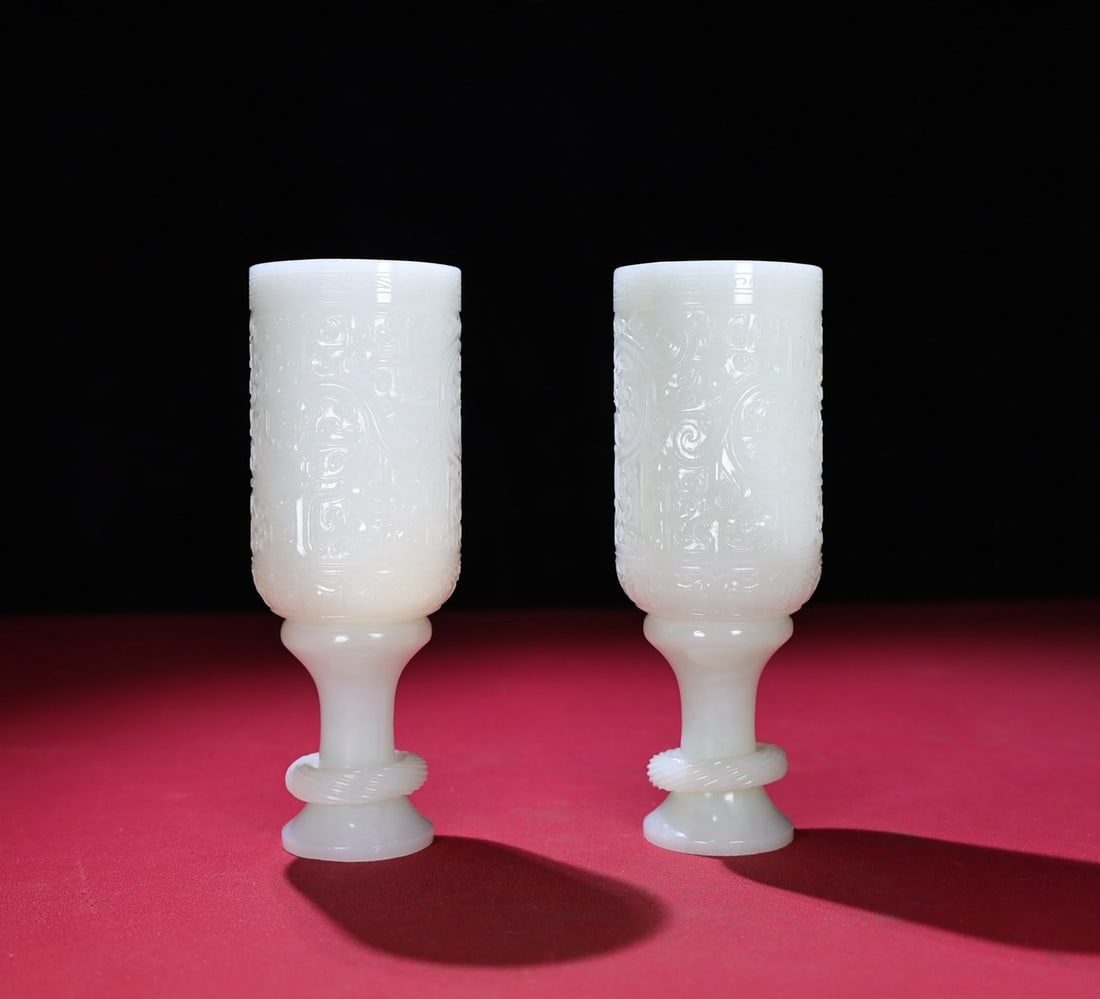 A pair of Exquisite Hotan White Jade Dragon Pattern Cup: A pair of Exquisite Hotan White Jade Dragon Pattern Cup,Qing Dynasty,China,Size:6.1inx2.2in,Weight:374g 