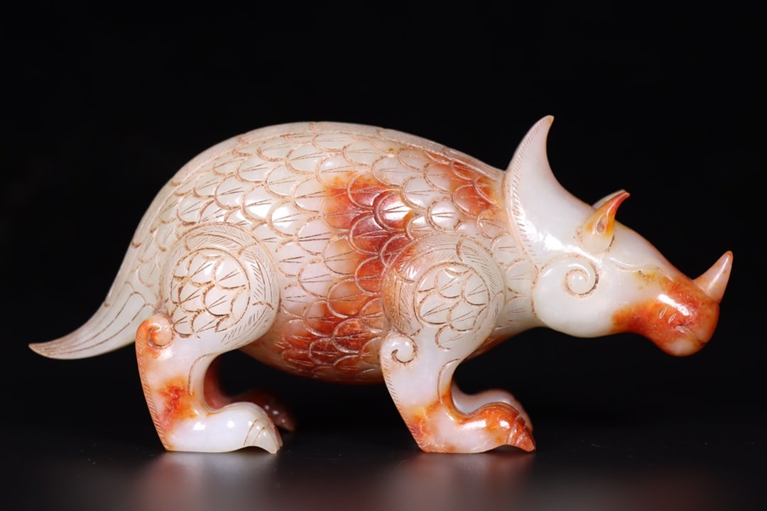 A Exquisite Hotan Jade Auspicious Beast Ornament: A Exquisite Hotan Jade Auspicious Beast Ornament,Han Dynasty, China,Size:6.5inx2.4inx3.1in,Weight:679g 和田玉瑞兽摆件,中国汉代