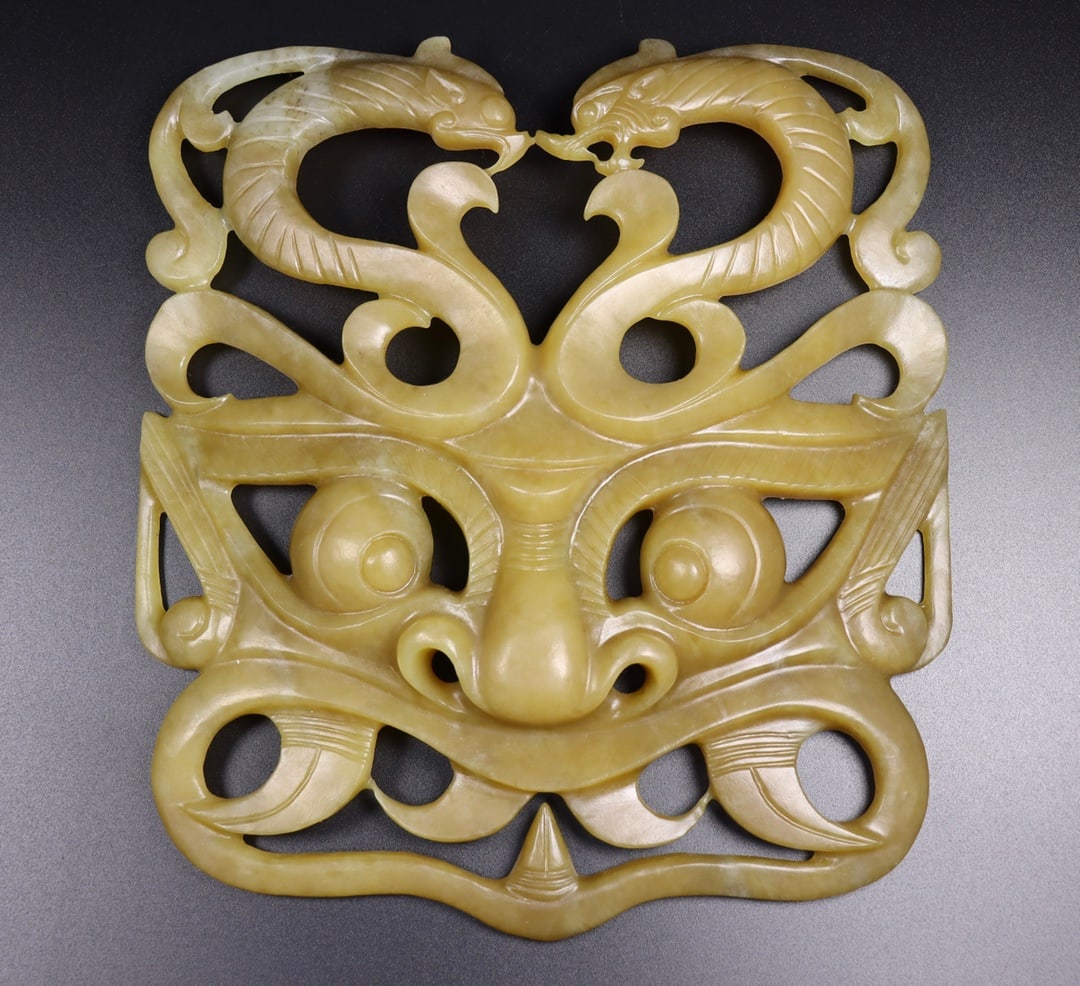 A Exquisite Hotan Jade Beast-Face Pattern Ornament: A Exquisite Hotan Jade Beast-Face Pattern Ornament,Han Dynasty, China,Size:9.3inx8.5inx1.6in,Weight:732g 
