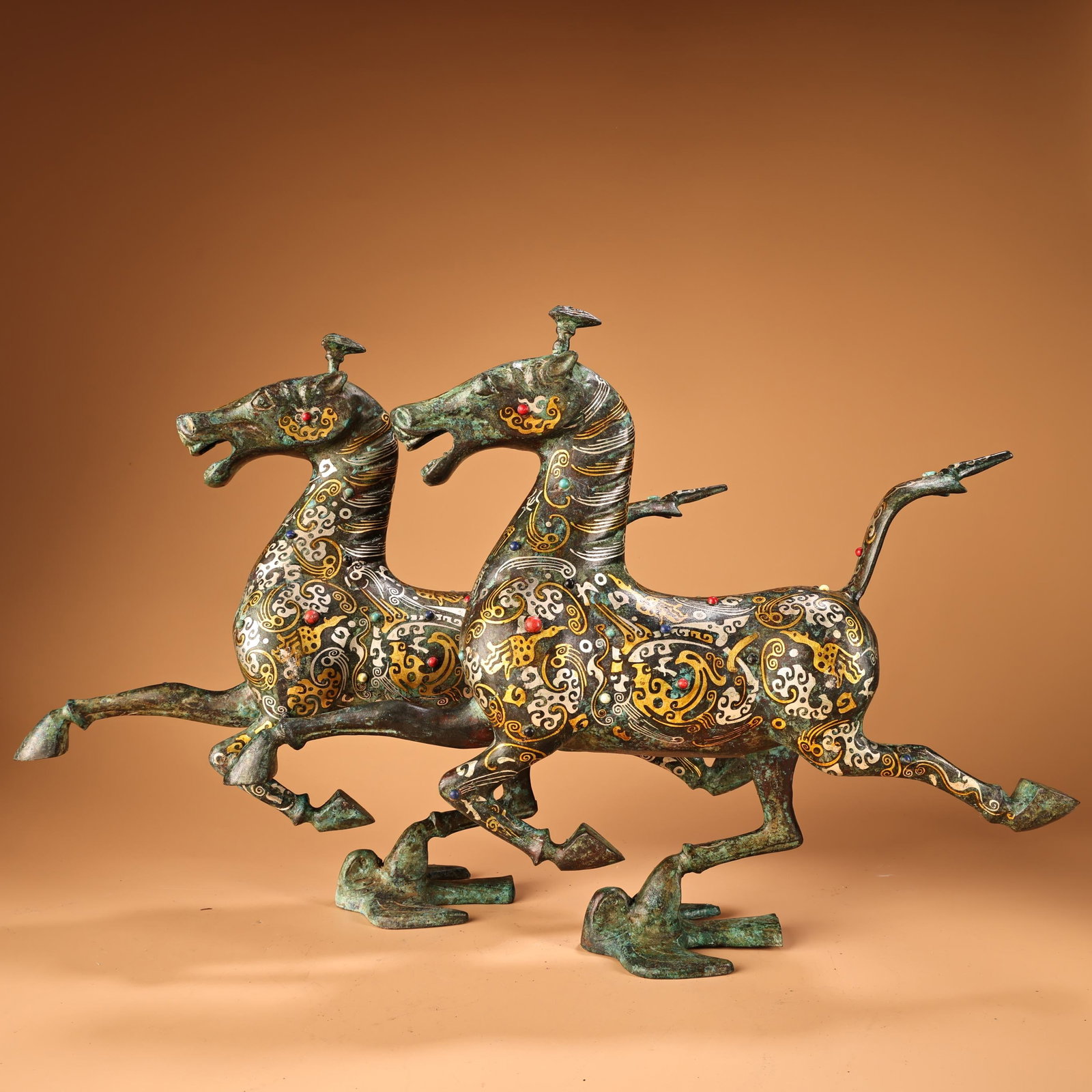 A pair of Exquisite Gold and Silver-Inlaid Bronze Inlaid Gems Horse Ornament: A pair of Exquisite Gold and Silver-Inlaid Bronze Inlaid Gems Horse Ornament,Han Dynasty,China,Size:14.2inx16.5in,Weight:2600g 