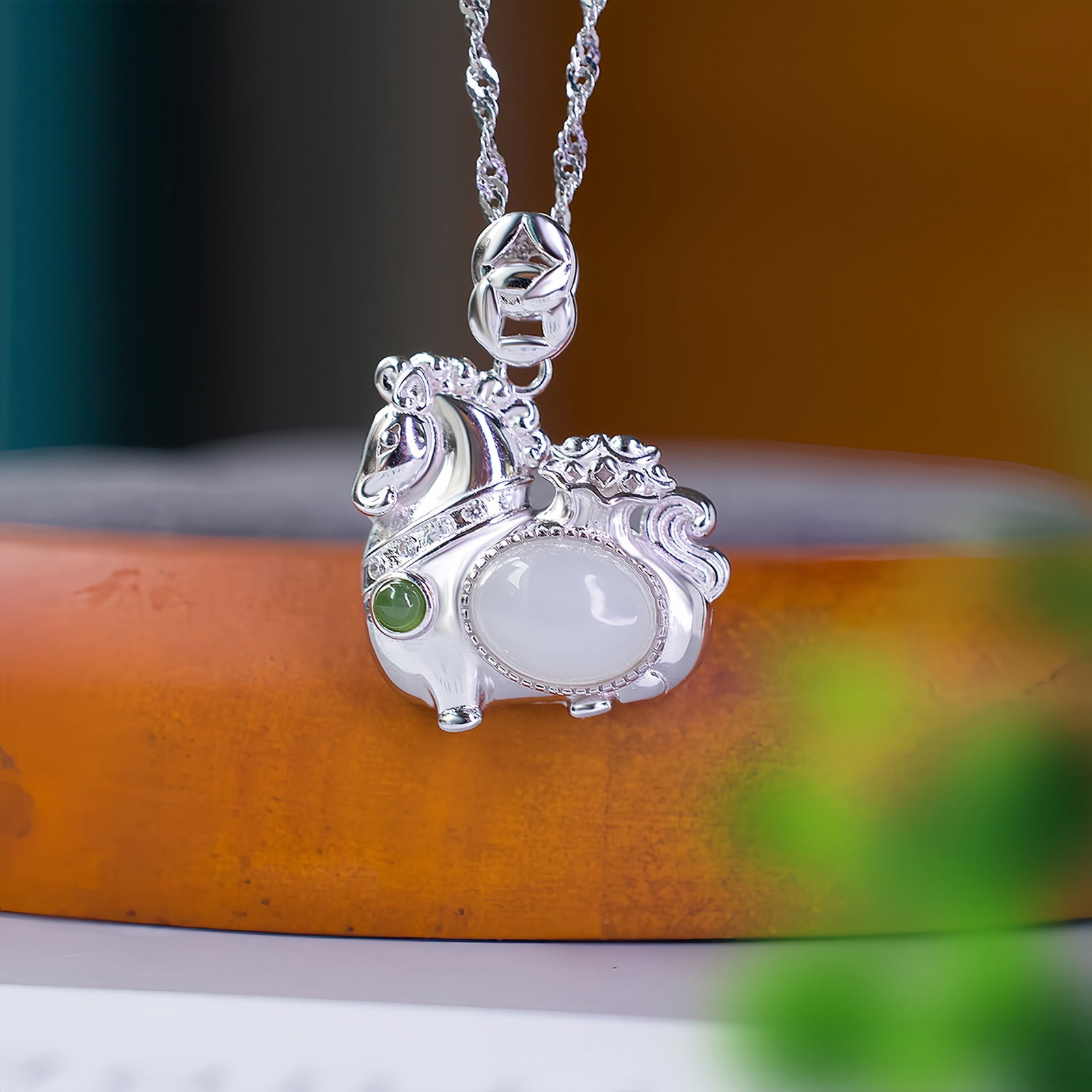 A Exquisite Silver Inlaid Hotan Jade Horse-shaped Pendant: A Exquisite Silver Inlaid Hotan Jade Horse-shaped Pendant,Size:0.2inx0.3in 银镶和田玉马上来财吊坠