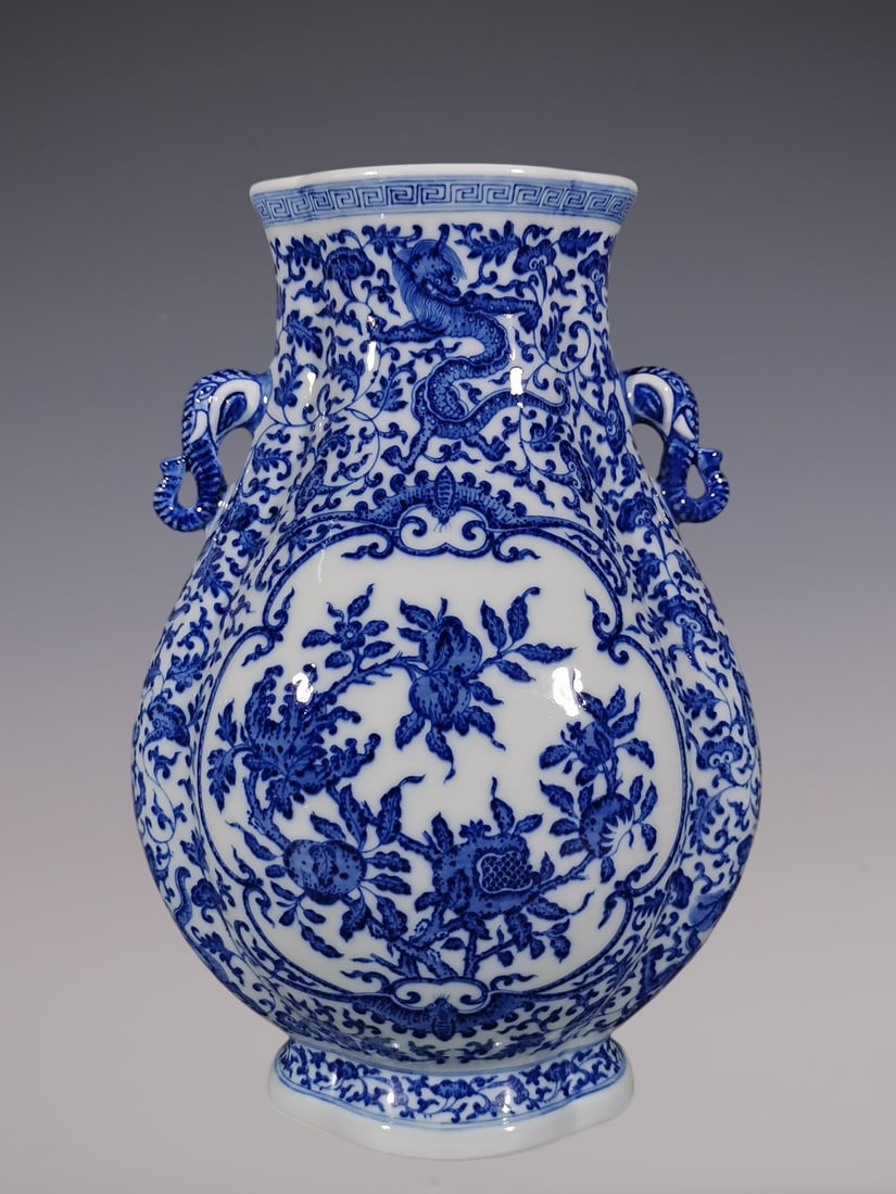 An Exquisite Blue and White Lotus Pattern Dragon Pattern Flower and Fruit Pattern Double-Ears Vase: An Exquisite Blue and White Lotus Pattern Dragon Pattern Flower and Fruit Pattern Double-Ears Vase Qing Dynasty, China Qianlong Six-character Mark Size:14.8inx9.8in青花缠枝!