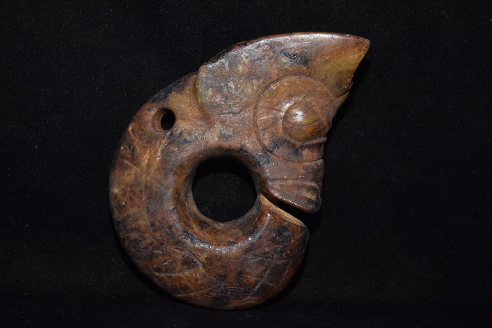 An Exquisite Hemo Jade 'Boar& Dragon' Ornament: An Exquisite Hemo Jade 'Boar& Dragon' Ornament Hongshan Culture Size:4.7inx6.3in Weight:820g河磨玉猪龙 红山文化 Size:12cmx16cm Weight:820g