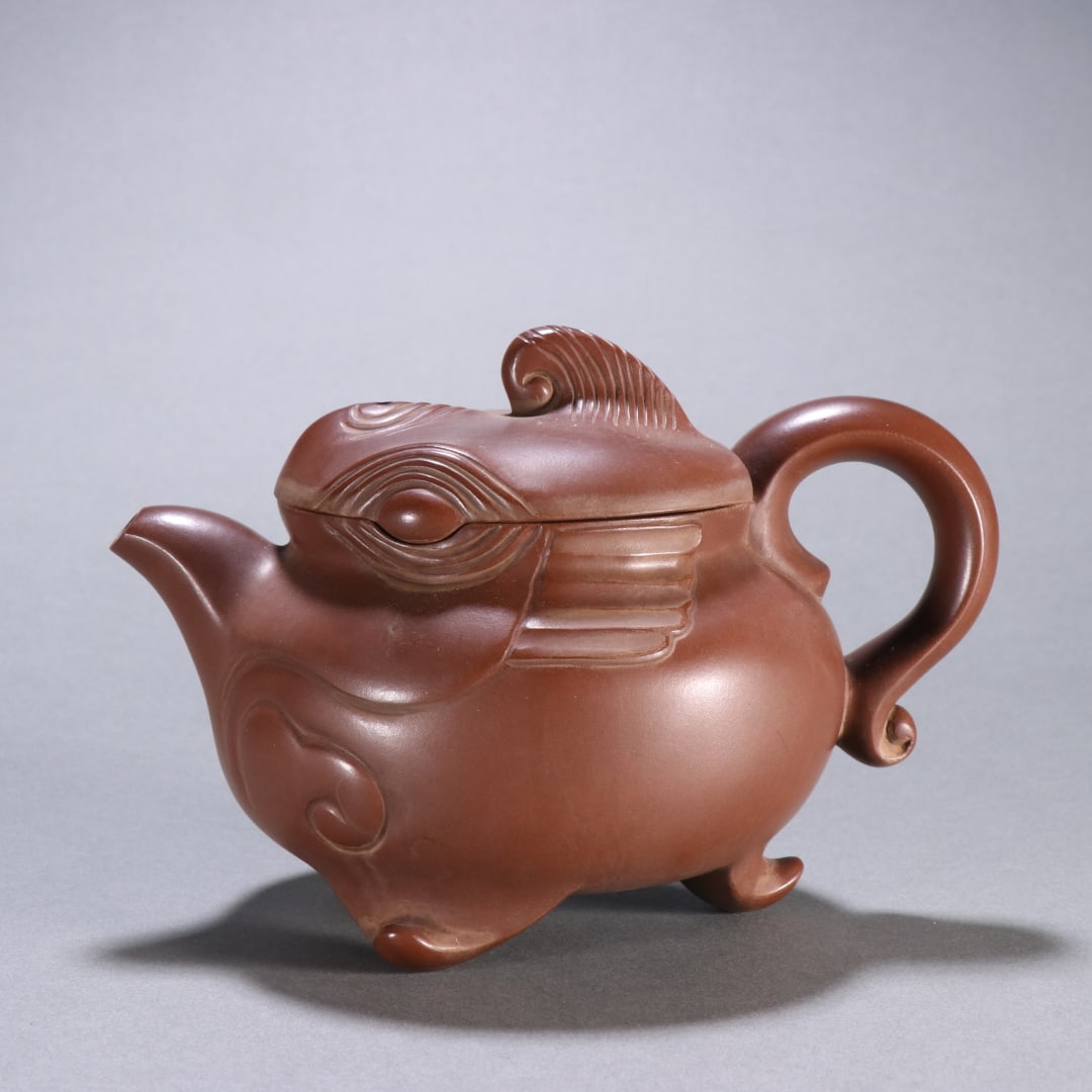 An Exquisite Purple Sands Teapot: An Exquisite Purple Sands Teapot Qing Dynasty, China Size:4.6inx6.3in紫砂灵豹茶壶 中国清代 Size:11.7cmx16cm