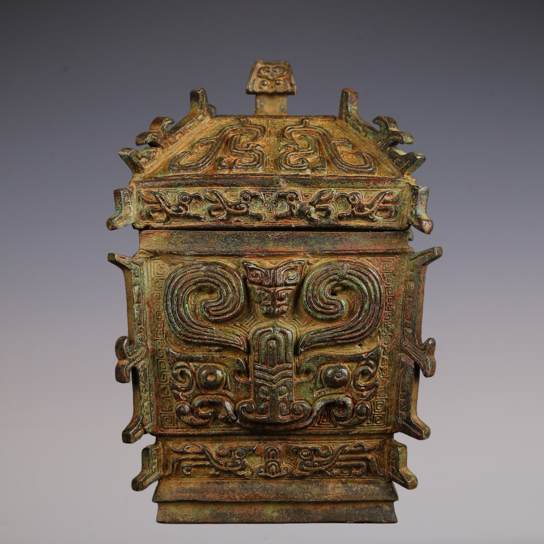 An Exquisite Bronze Beast-Face Pattern Censer: An Exquisite Bronze Beast-Face Pattern Censer W.Zhou , China Size:4.7inx8.3in Weight:2450g青铜饕餮纹方罍 西周时期 Size:12cmx21cm Weigh