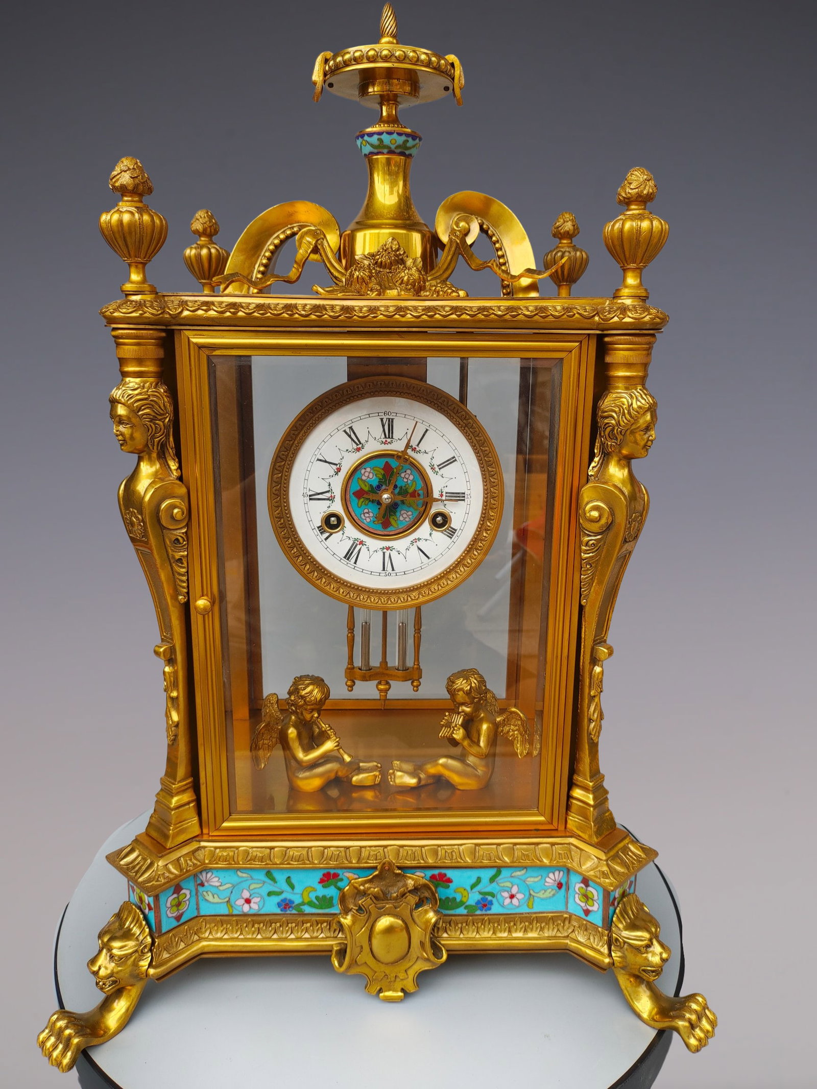 An Exquisite Gilt Bronze Lotus Pattern Clock: An Exquisite Gilt Bronze Lotus Pattern Clock Qing Dynasty, China Size:16.1inx13inx24in铜鎏金缠枝莲纹钟表 中国清代 Size:41c