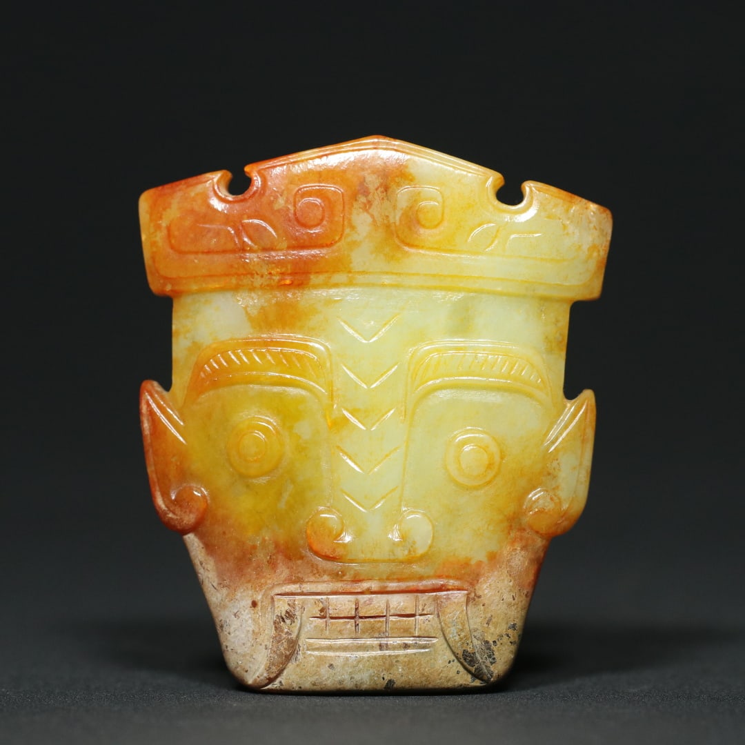 An Exquisite White Jade Pendant: An Exquisite White Jade Pendant W.Zhou , China Size:2.4inx2.1inx0.4in Weight:61.5g白玉面谱挂件 西周时期 Size:6.2cmx5.3cmx1cm Weight:61.5g